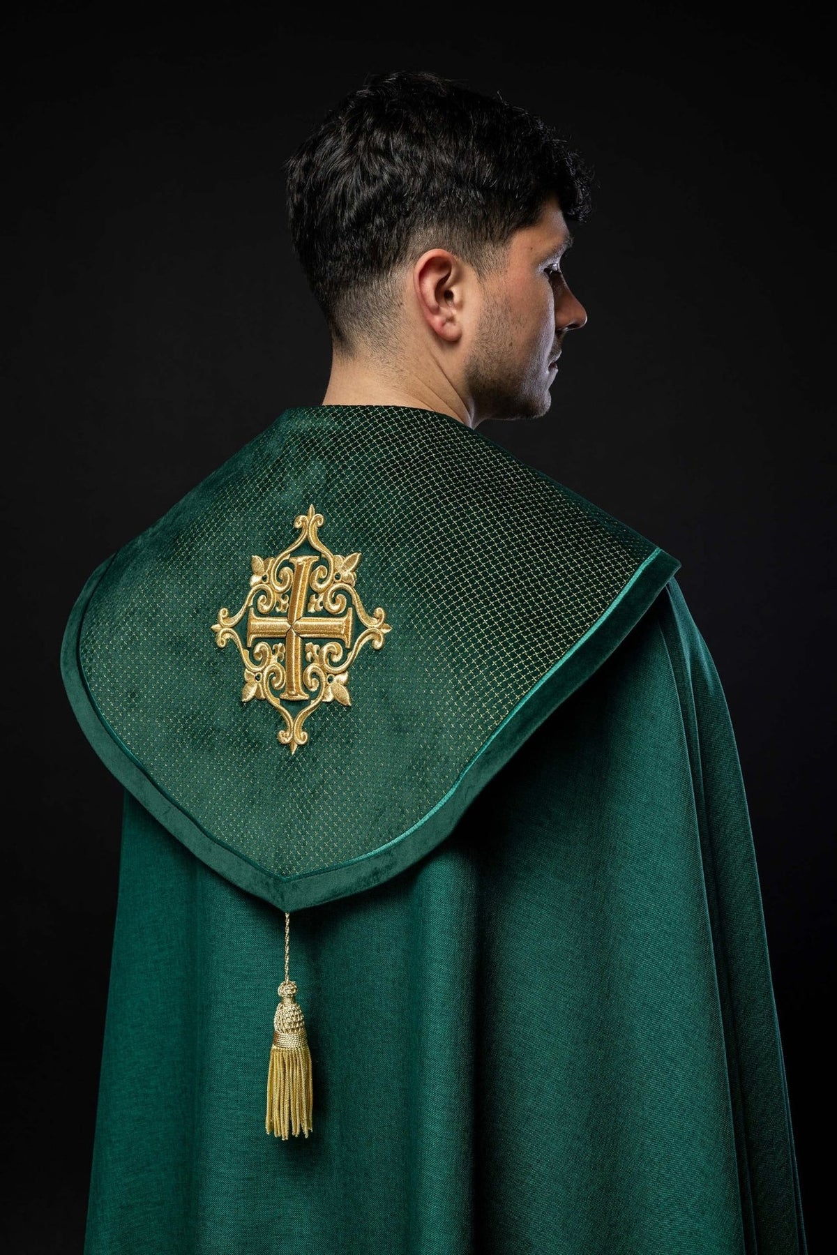Green velvet cope, back view with large embroidered cross and gold tassel