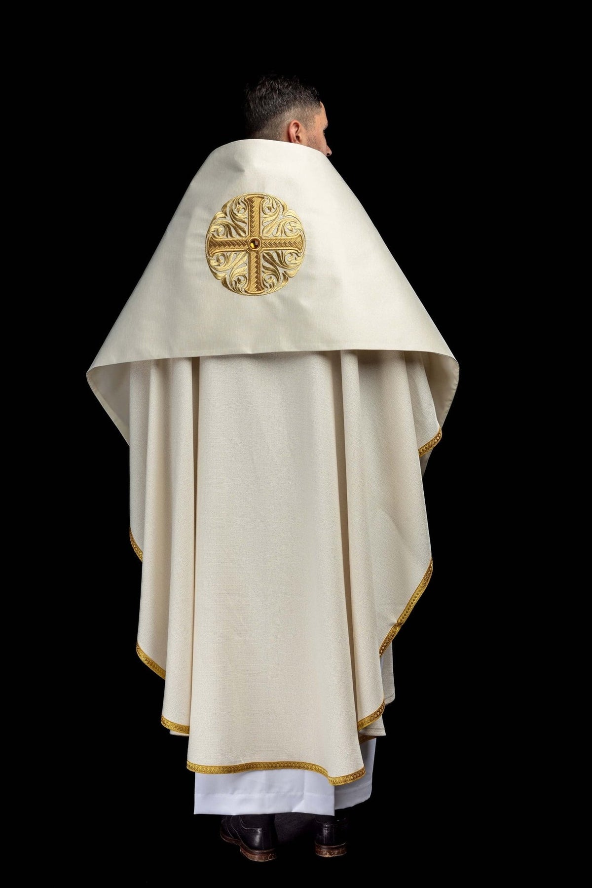 Humeral veil back view with embroidered gold cross and decorative stone
