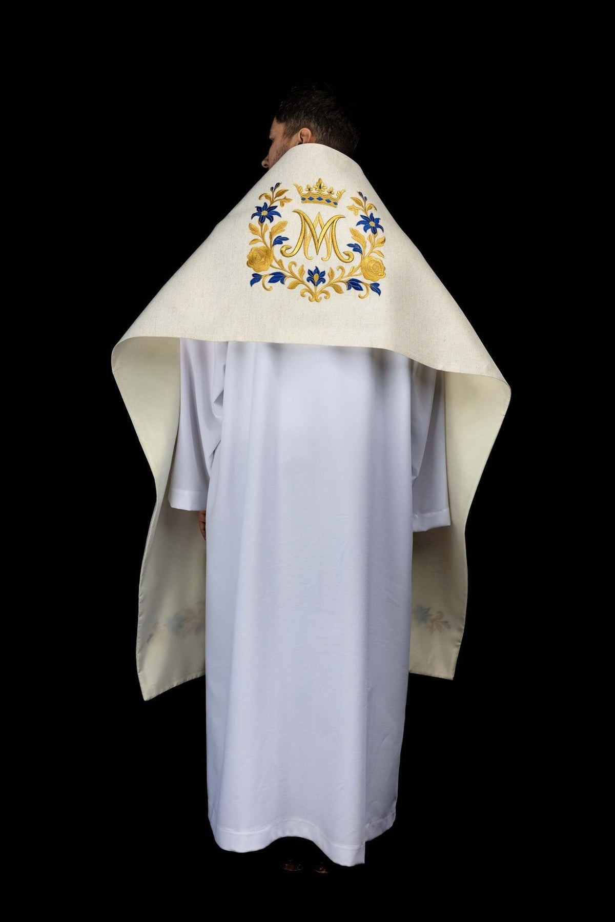 Embroidered humeral veil worn back view showing the Marian symbol and inner lining