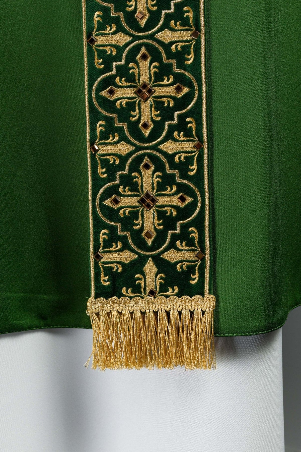 Green chasuble, close-up of repeated cross motifs on the orphrey