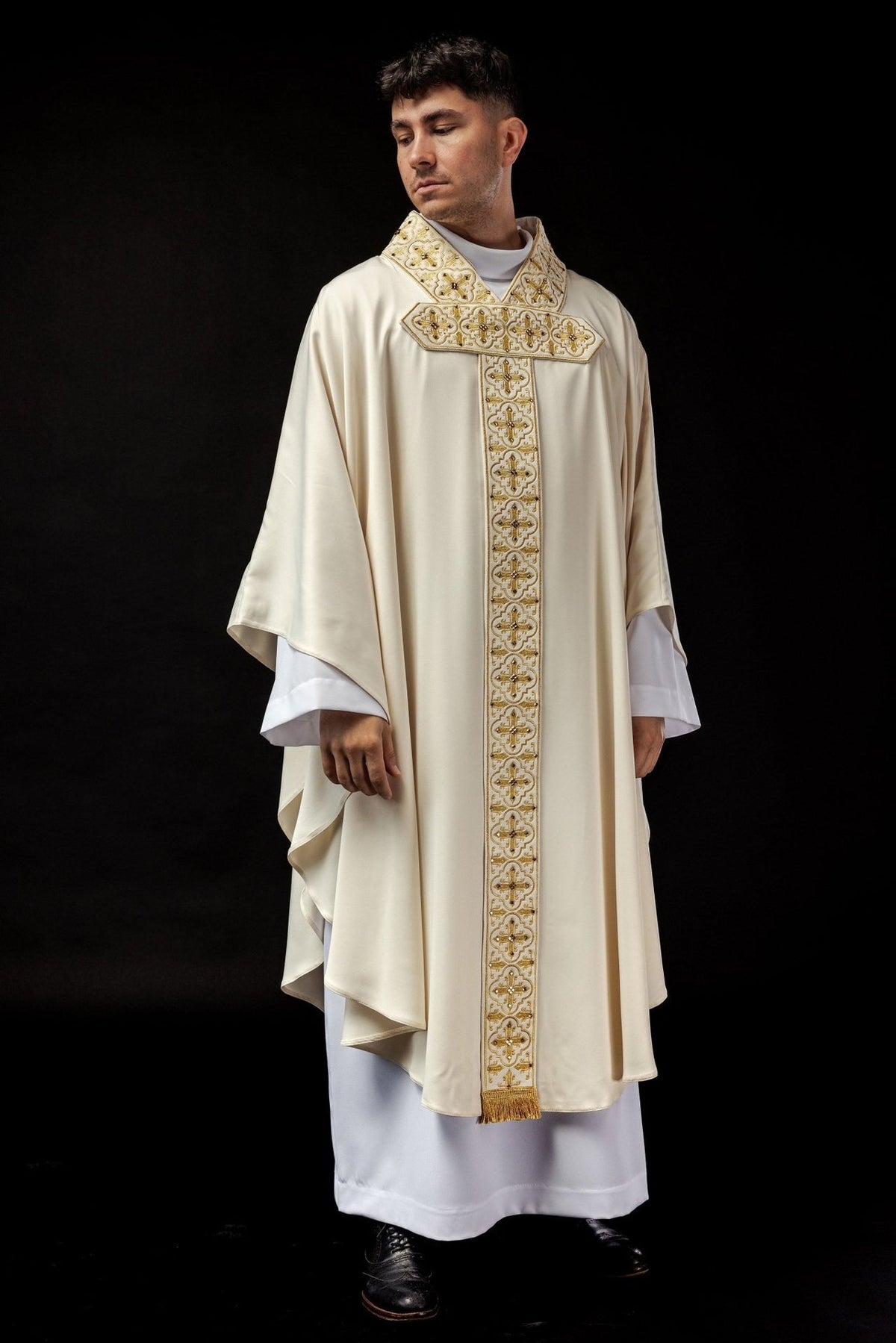Ivory embroidered chasuble, full front view with long gold orphrey and trim