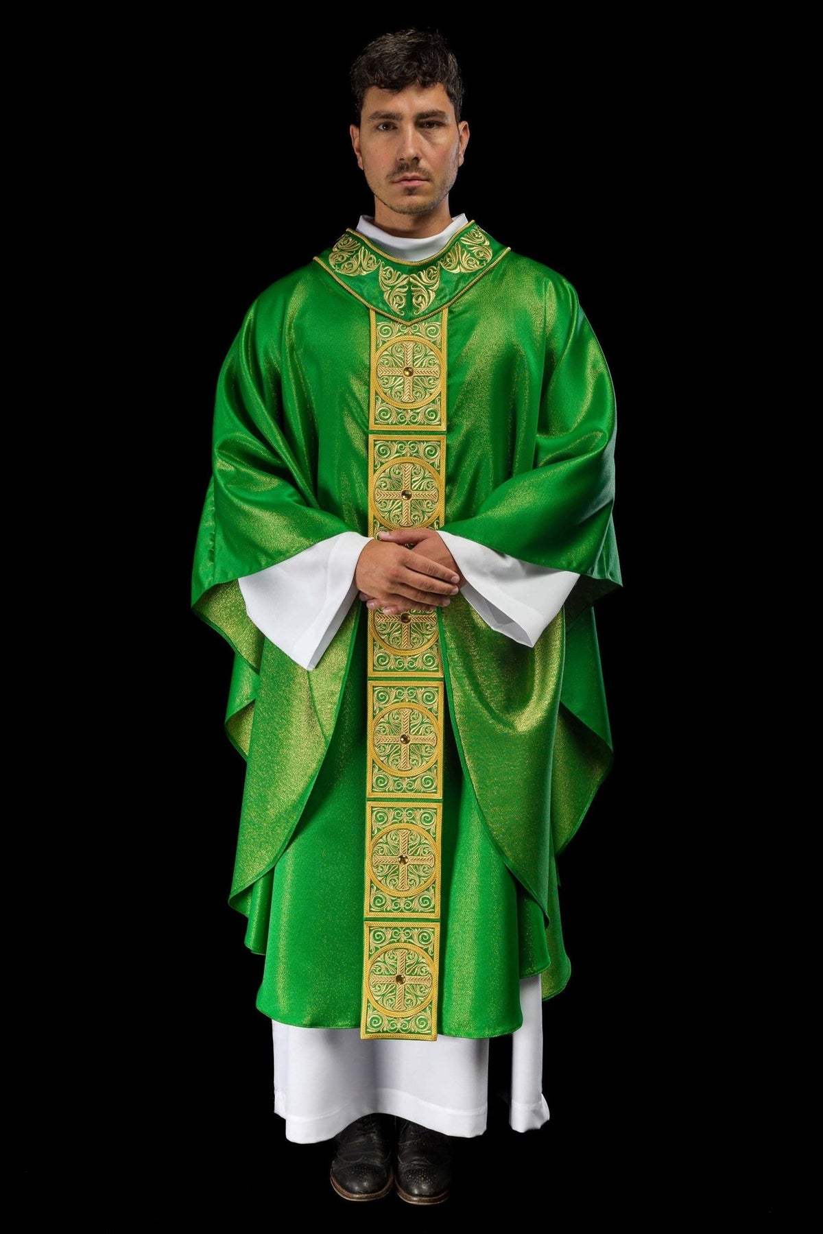 Green chasuble, full front view with embroidered orphrey and cross motifs