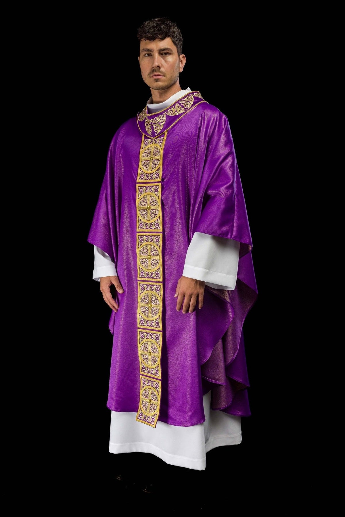 Purple chasuble three-quarter view with embroidered orphrey and flowing sleeves