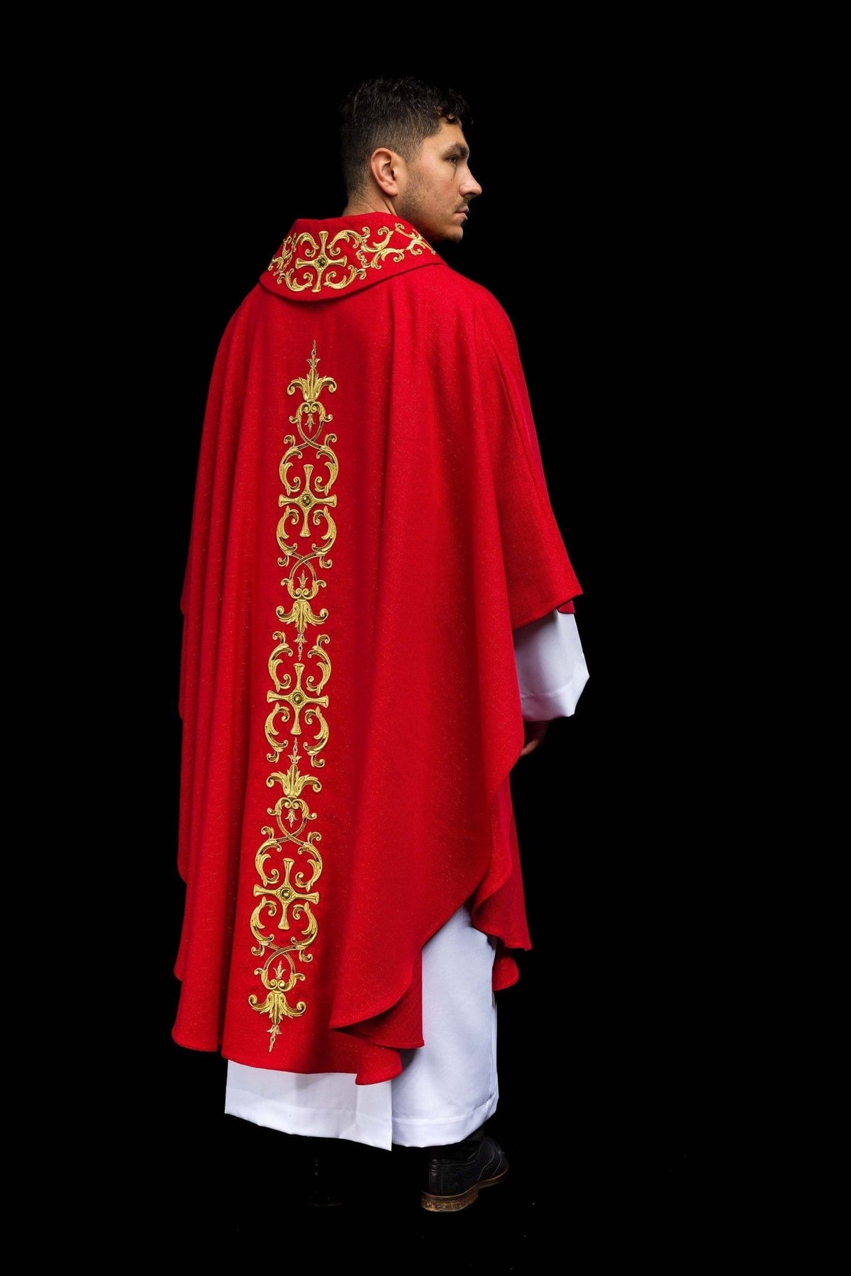 Red chasuble rear three-quarter view with long gold embroidery