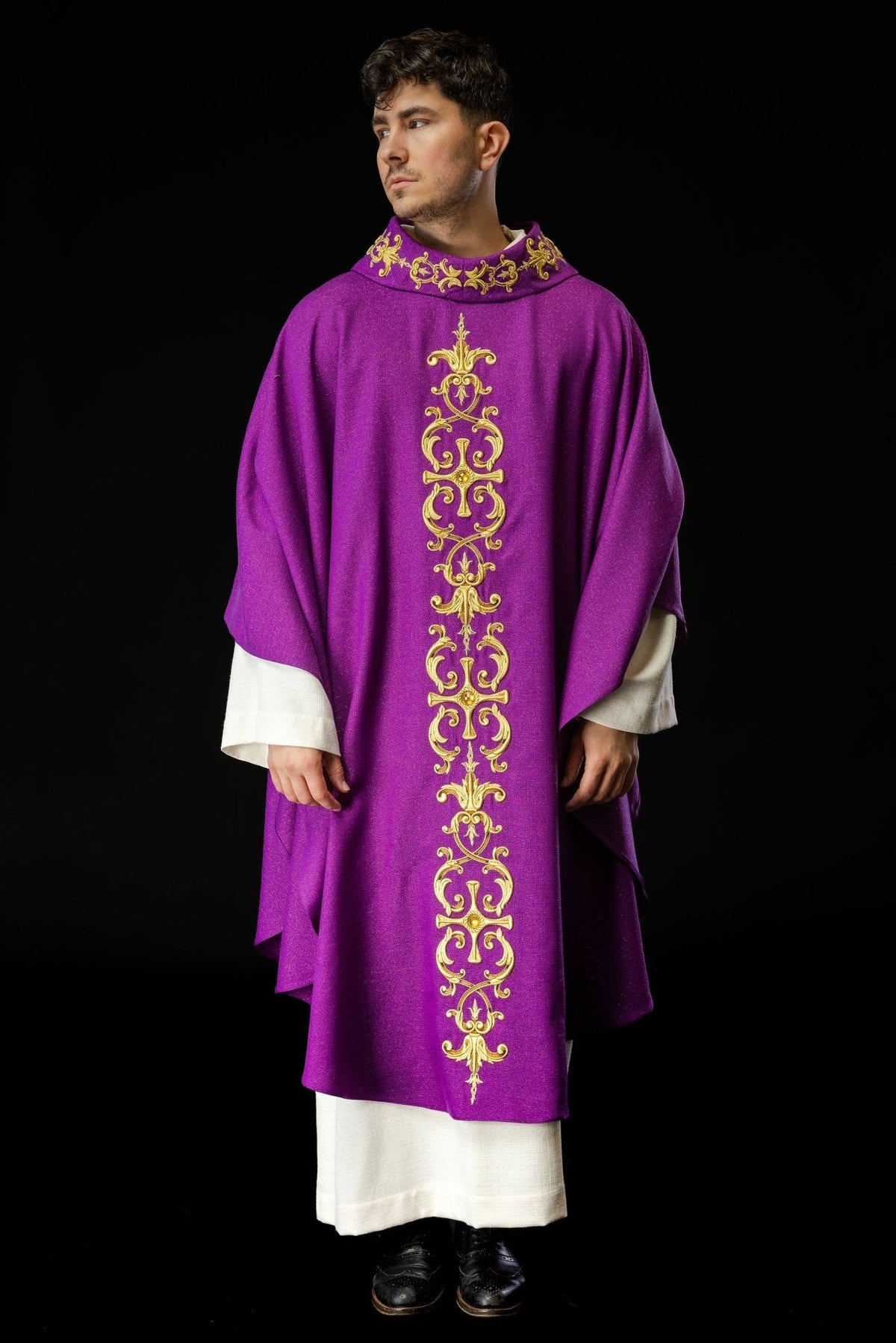 Purple chasuble full front view with gold embroidered cross and ornate motifs