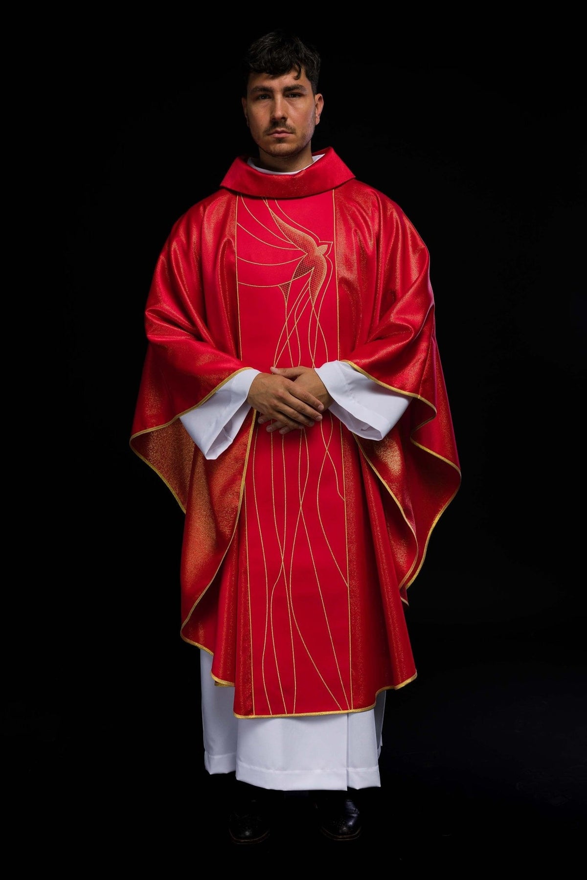 Red Chasuble with Holy Spirit Embroidery on Shimmering Fabric, front view worn