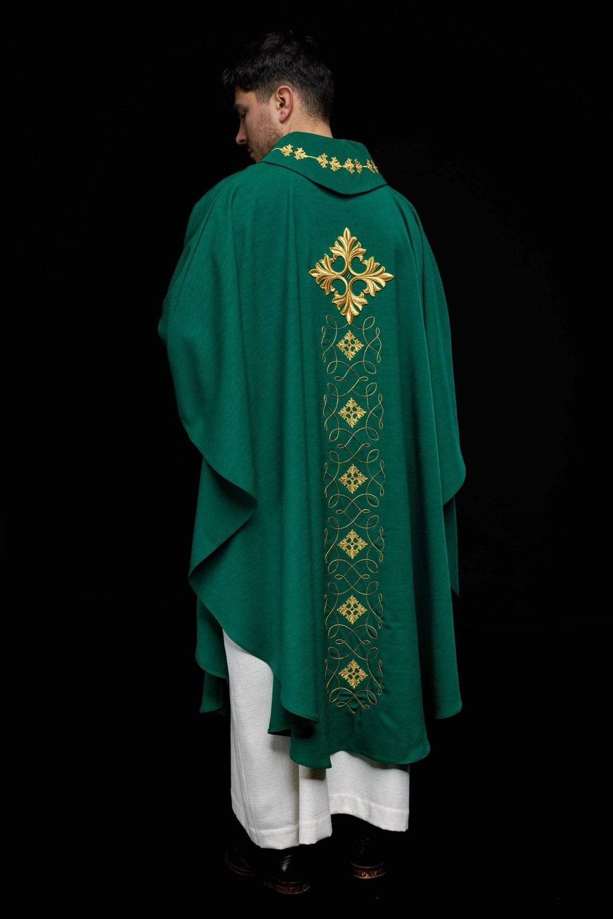 Green chasuble, back view with embroidered vertical cross and cord design