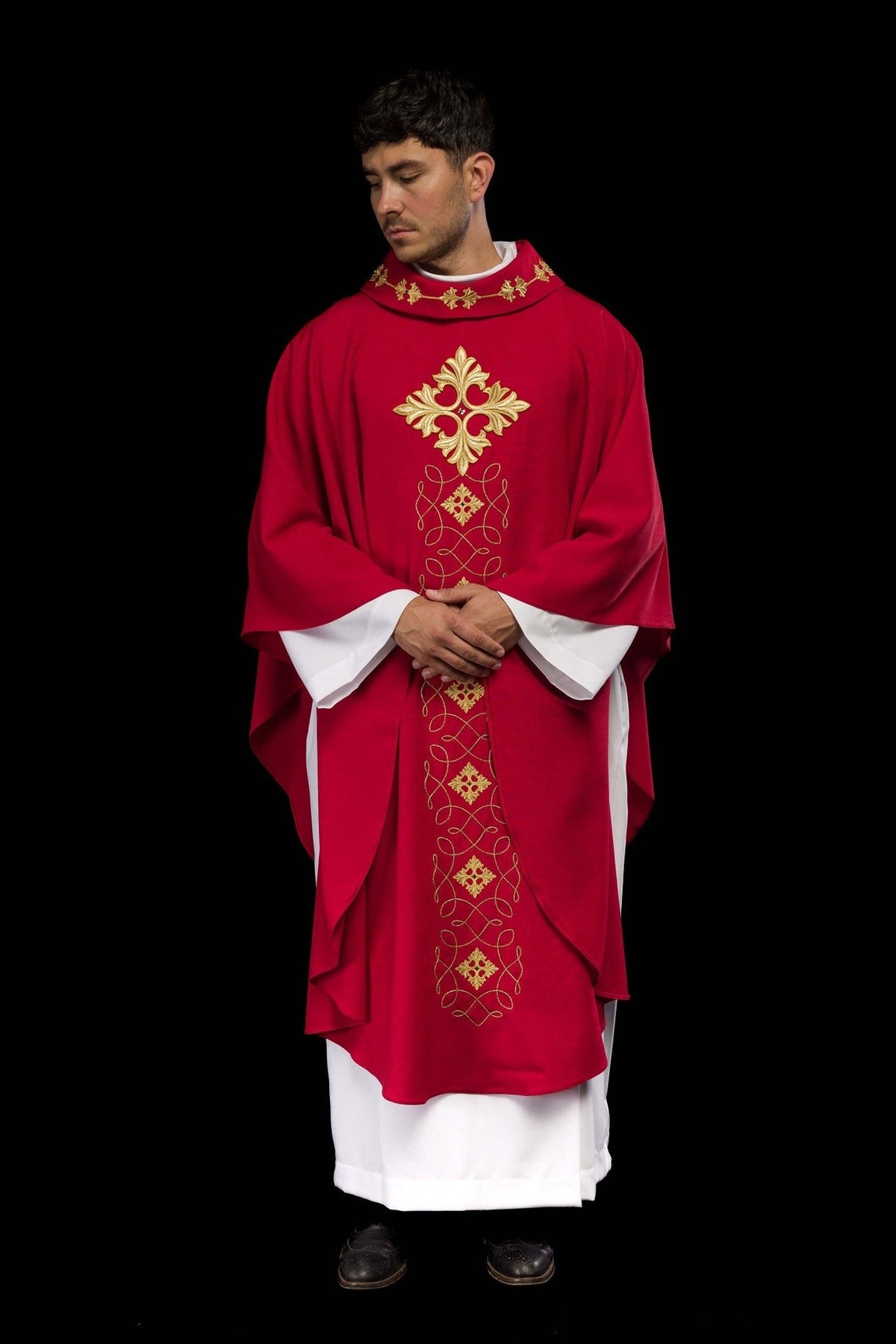 Red chasuble, full front view with gold embroidered cross and ornamental panel