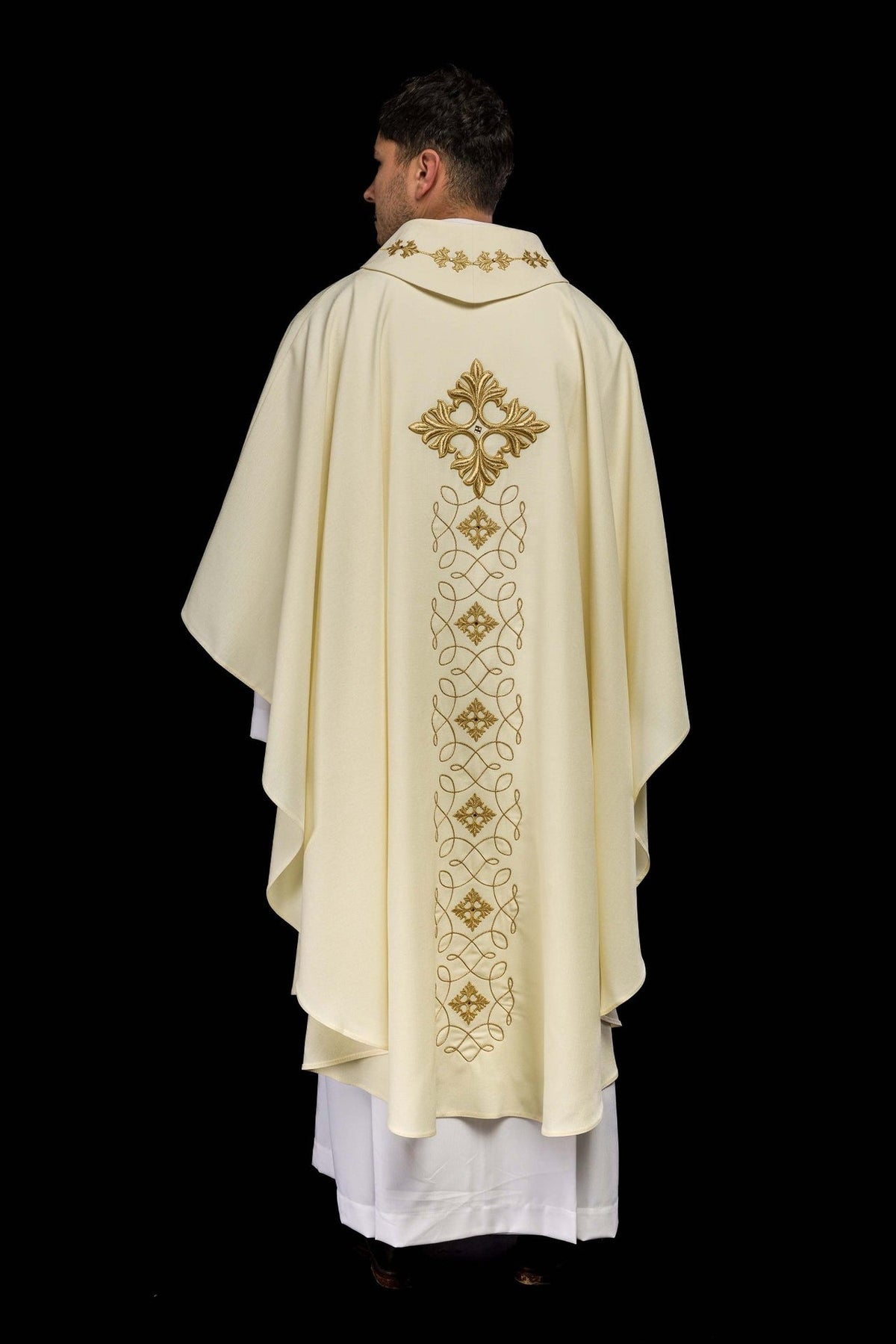 Ivory chasuble full back view with vertical gold embroidered motifs