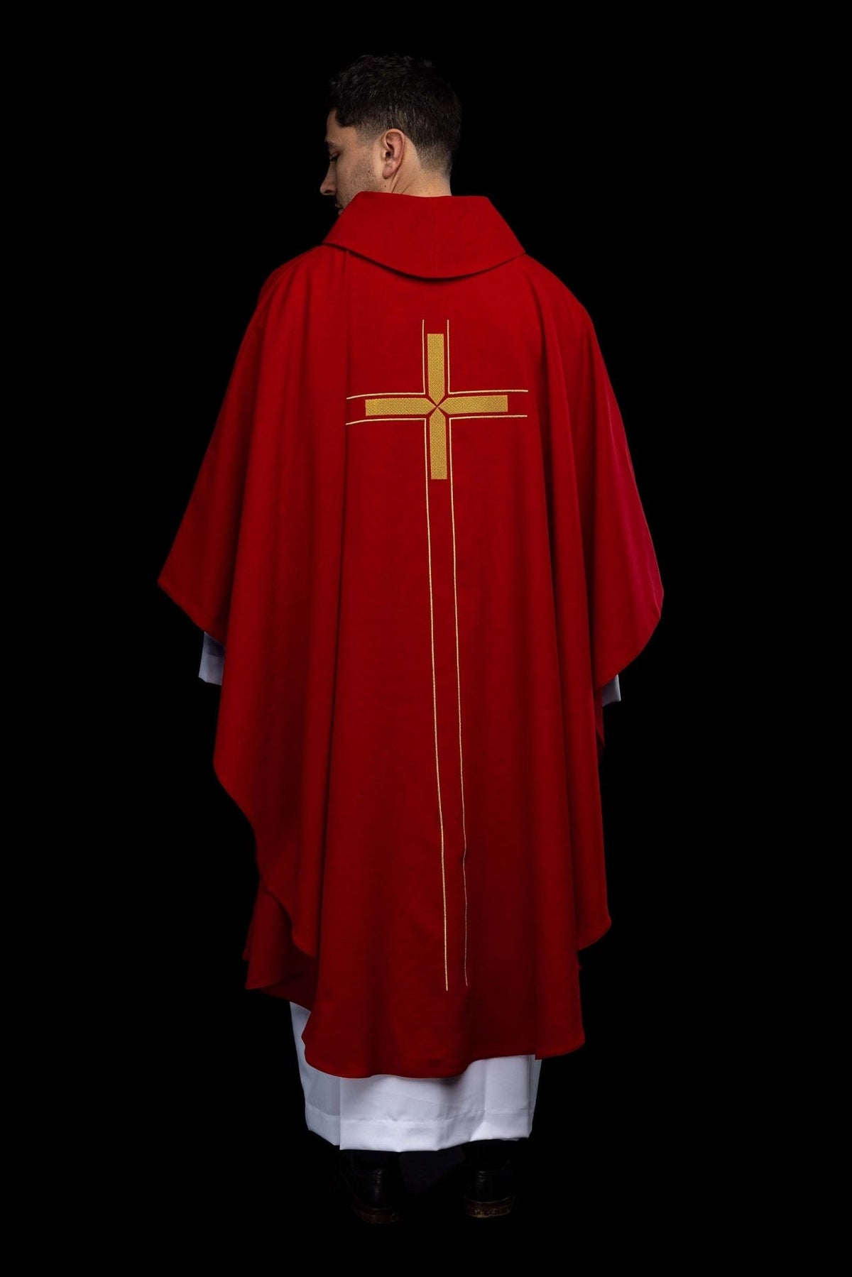 Red chasuble back close-up with gold cross embroidery