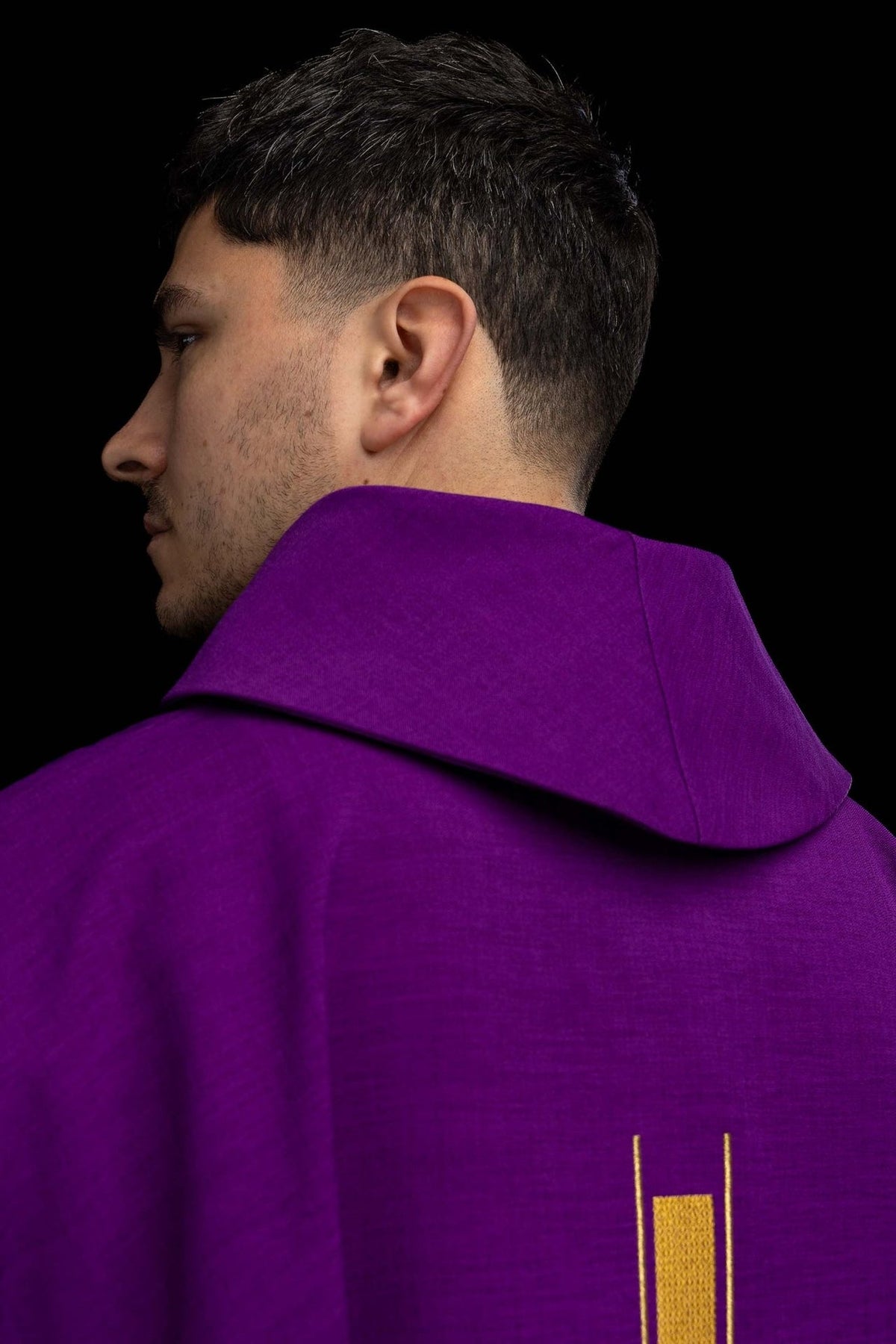Purple chasuble side view with stand-up collar and partial back embroidery