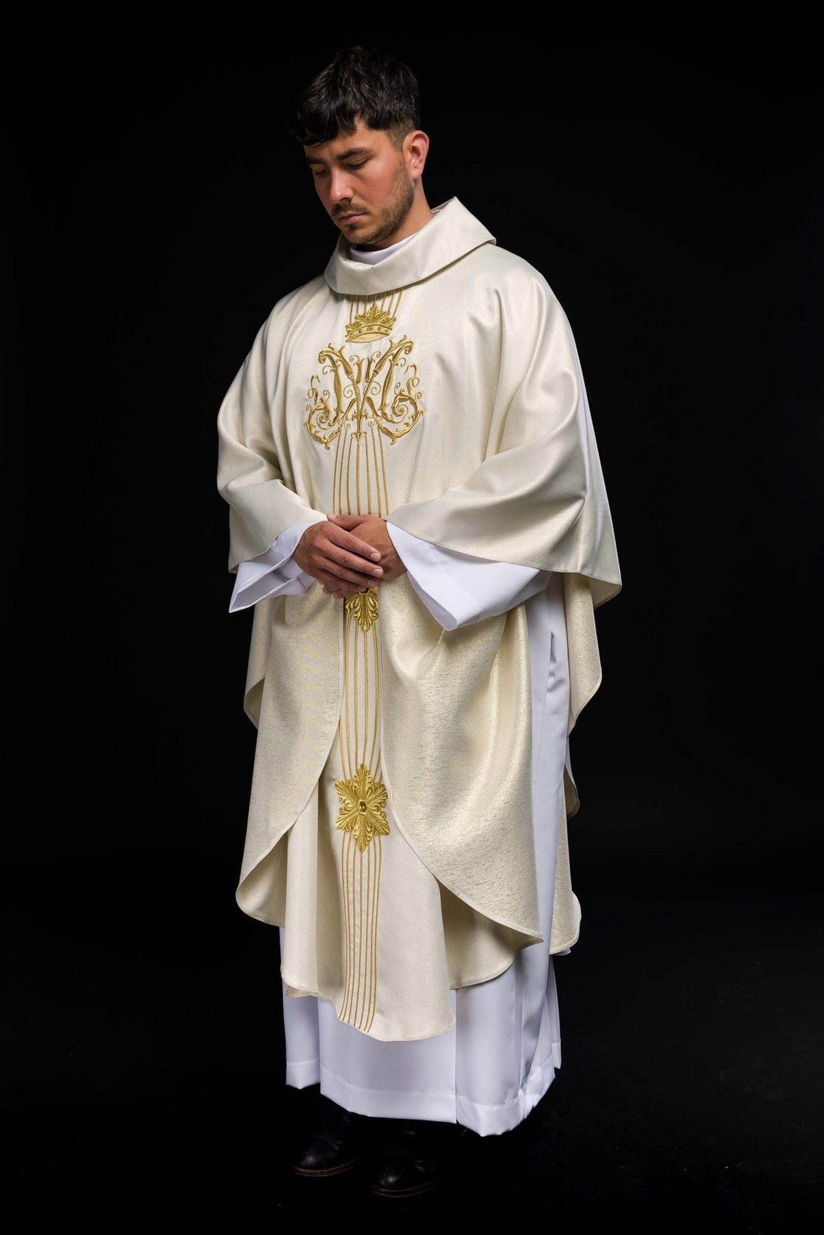 Ecru Marian chasuble angled front view with gold embroidery and stand-up collar