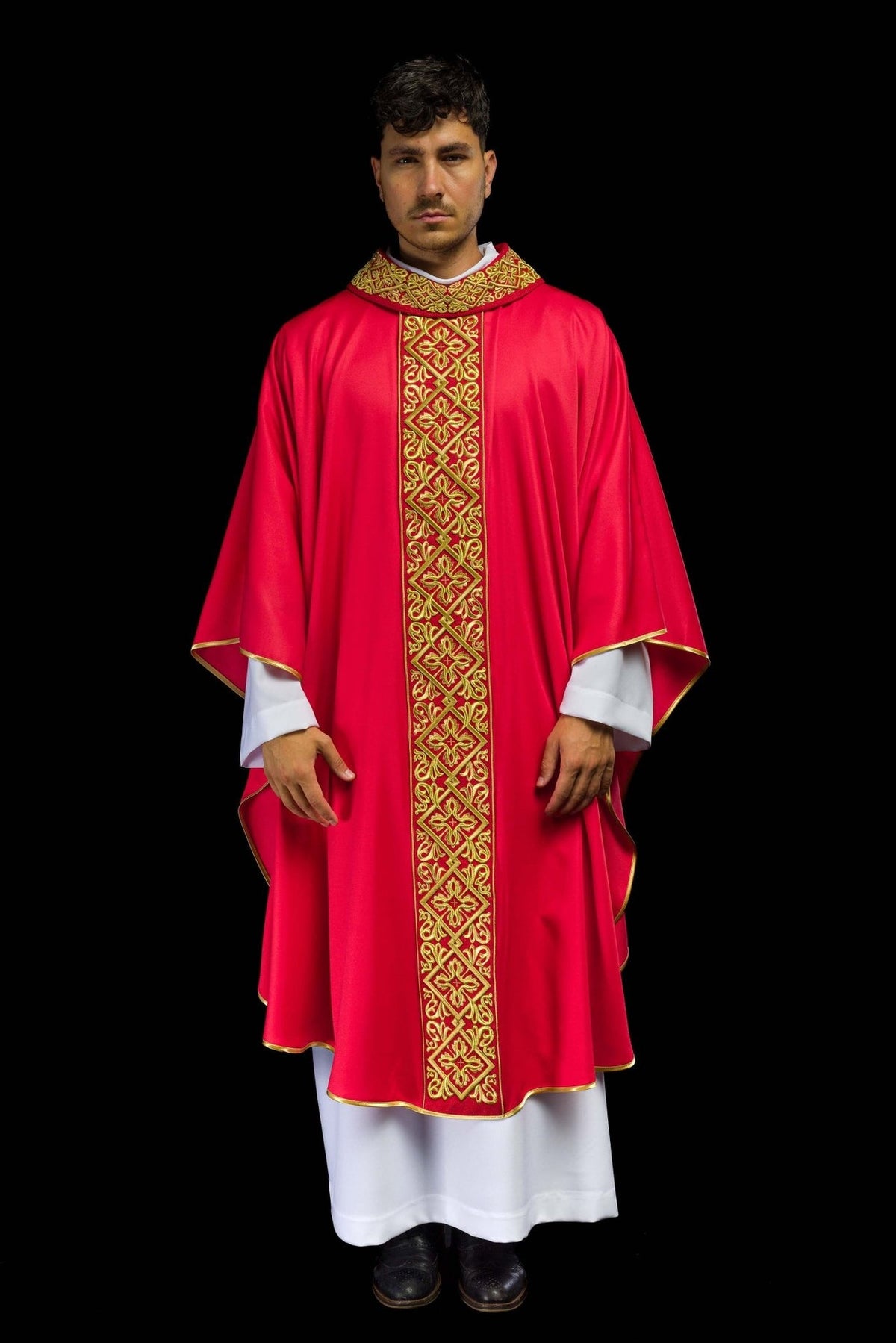 Red chasuble, full front view with gold embroidered floral motifs, crosses and trim