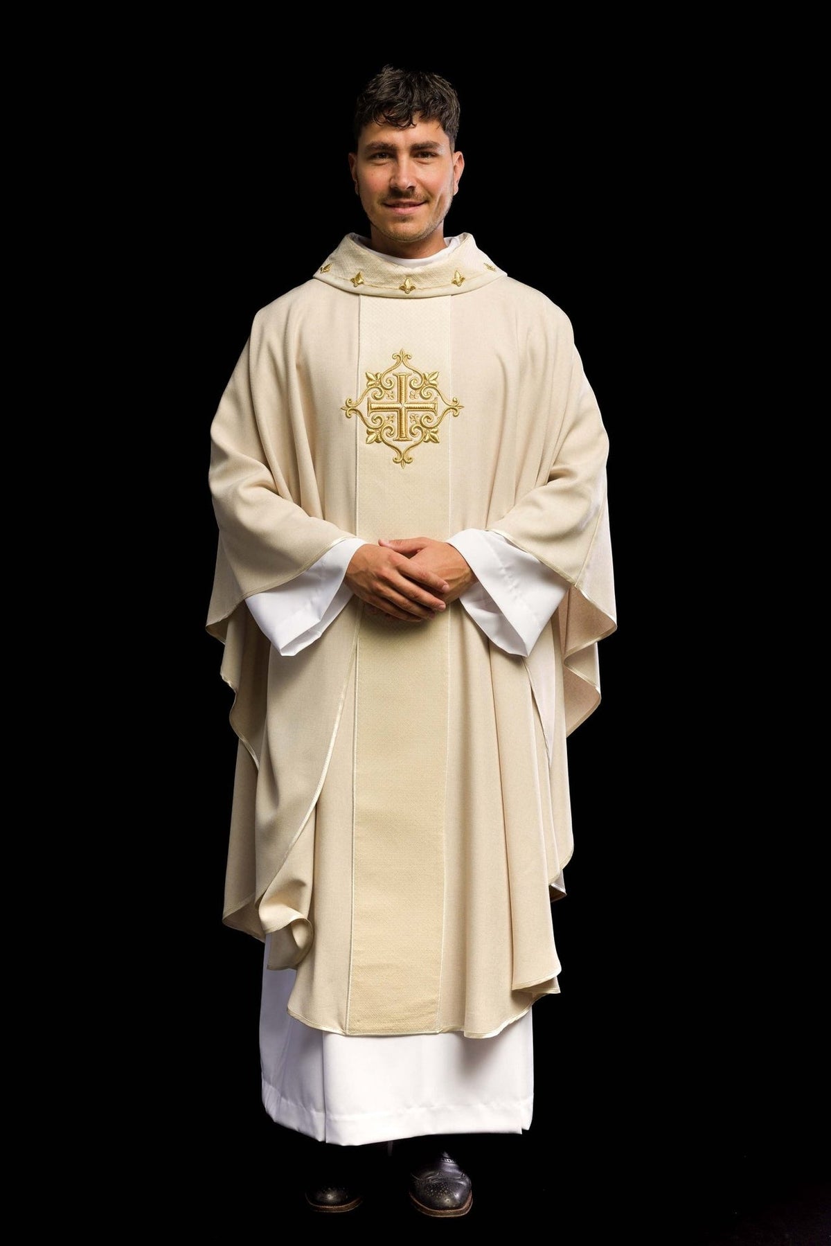 Ecru velvet chasuble, full front view with ornate gold cross embroidery