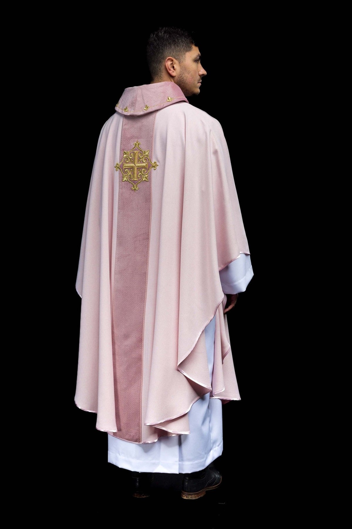 Pink chasuble back three-quarter view with embroidered central panel