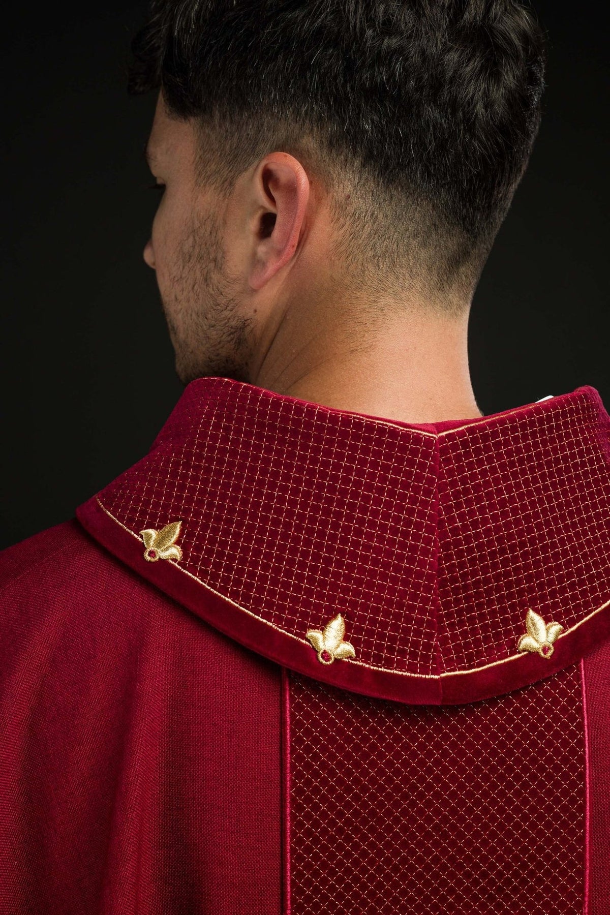 Red velvet chasuble, close-up of the front orphrey and cross embroidery