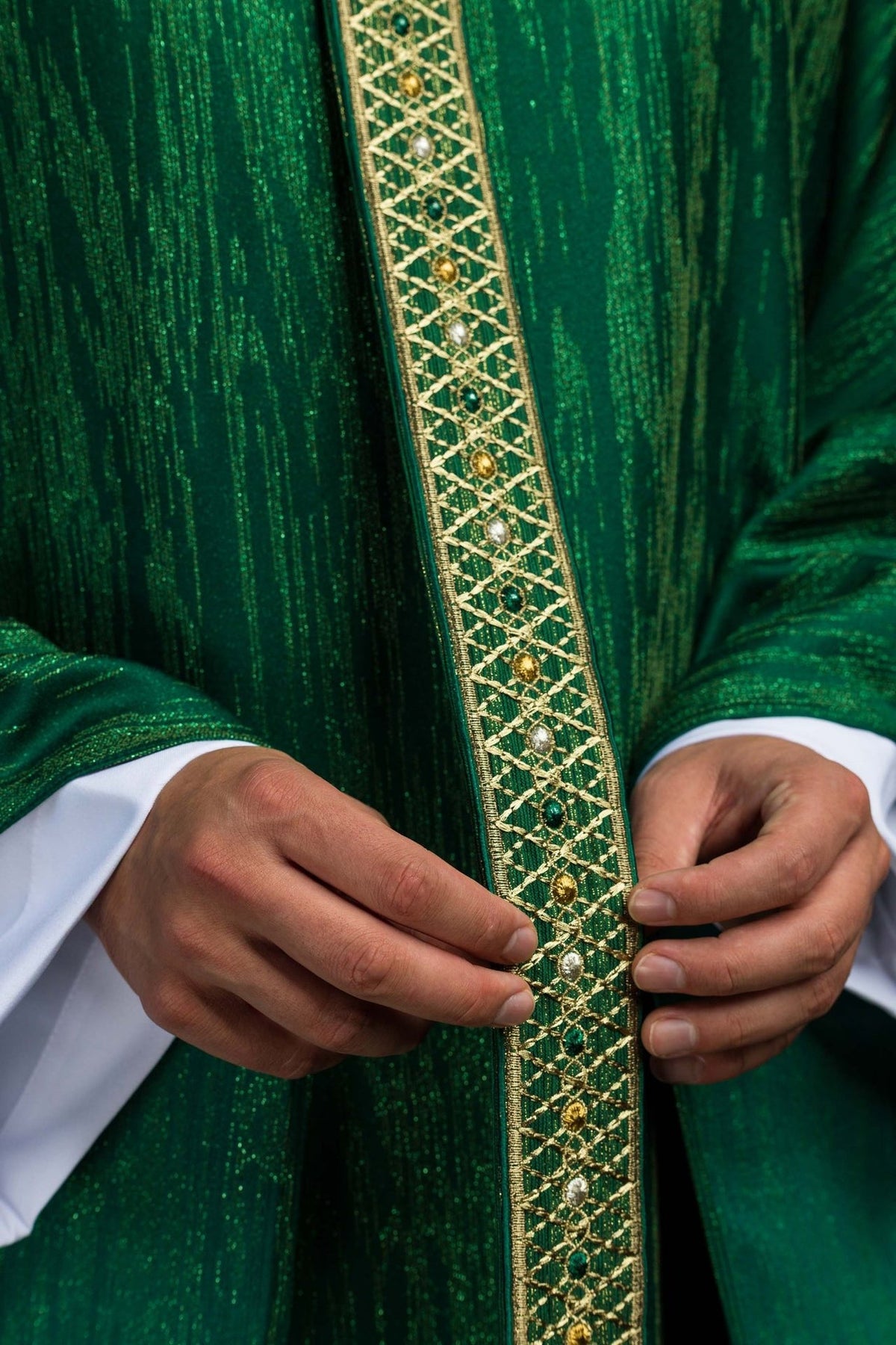 Green chasuble detail of gold embroidered orphrey with colored accents