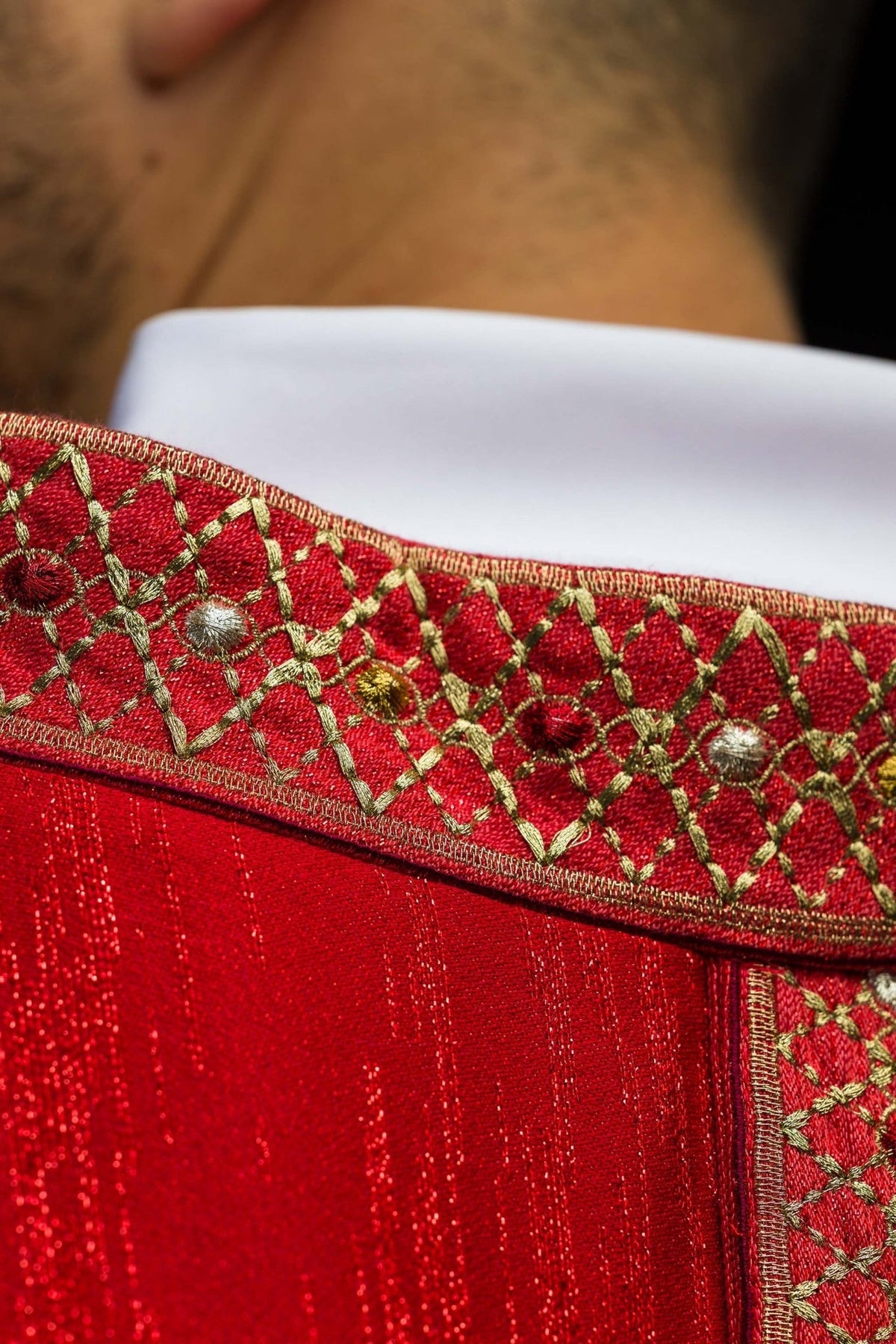 Red chasuble close-up of embroidered collar and central orphrey