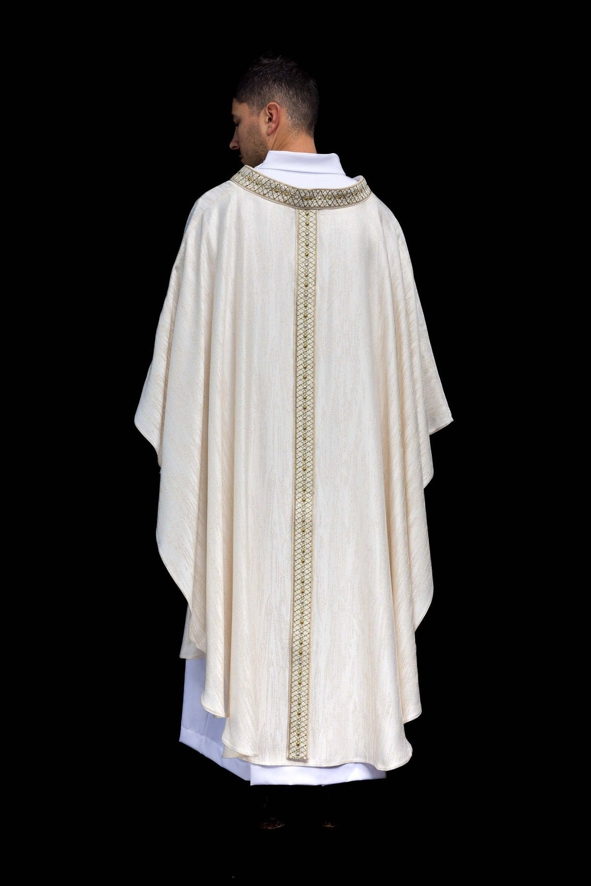 White chasuble back view with central embroidered orphrey
