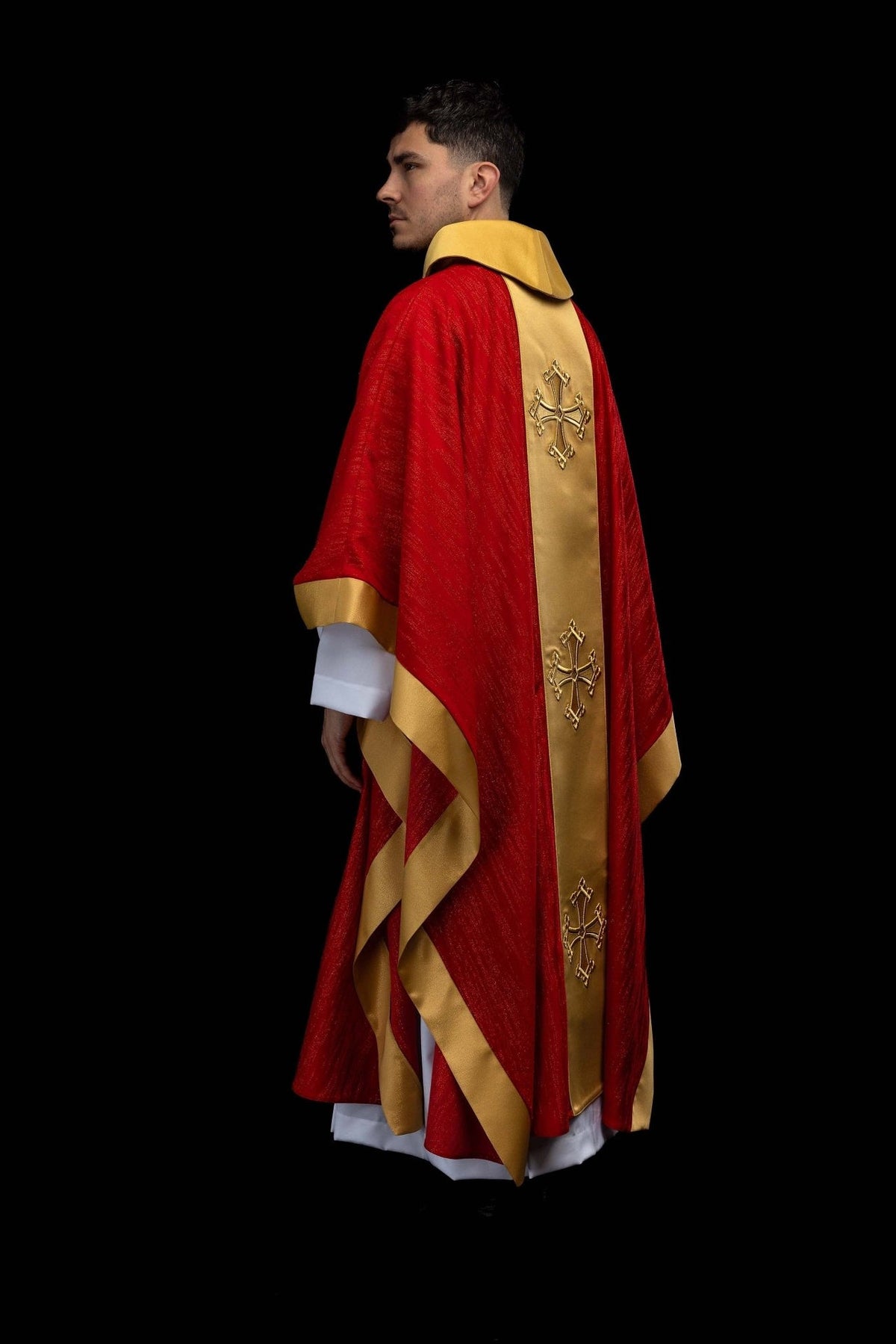 Red chasuble side-back view with gold orphrey and cross embroidery