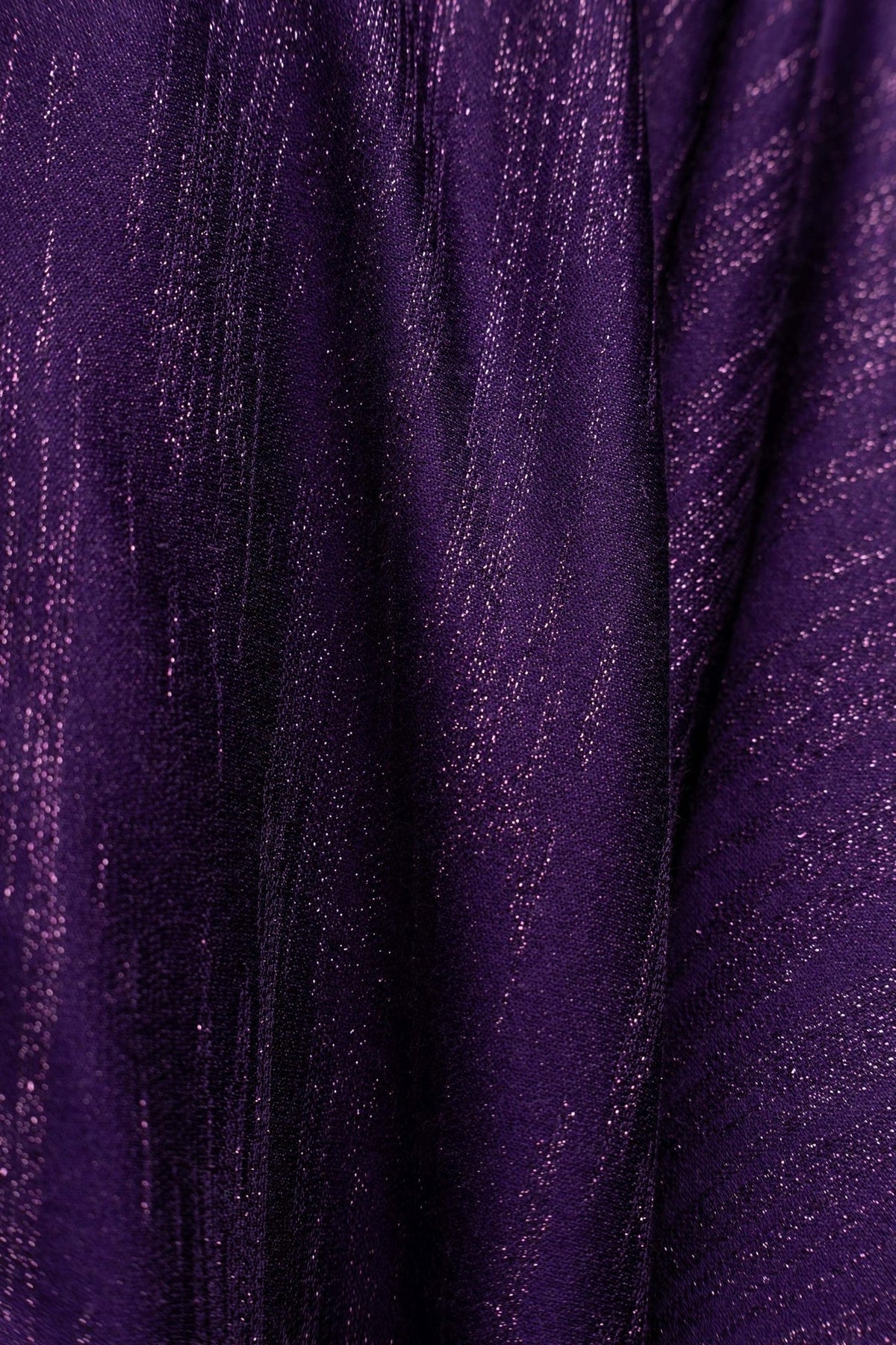 Purple chasuble sleeve close-up with gold trim