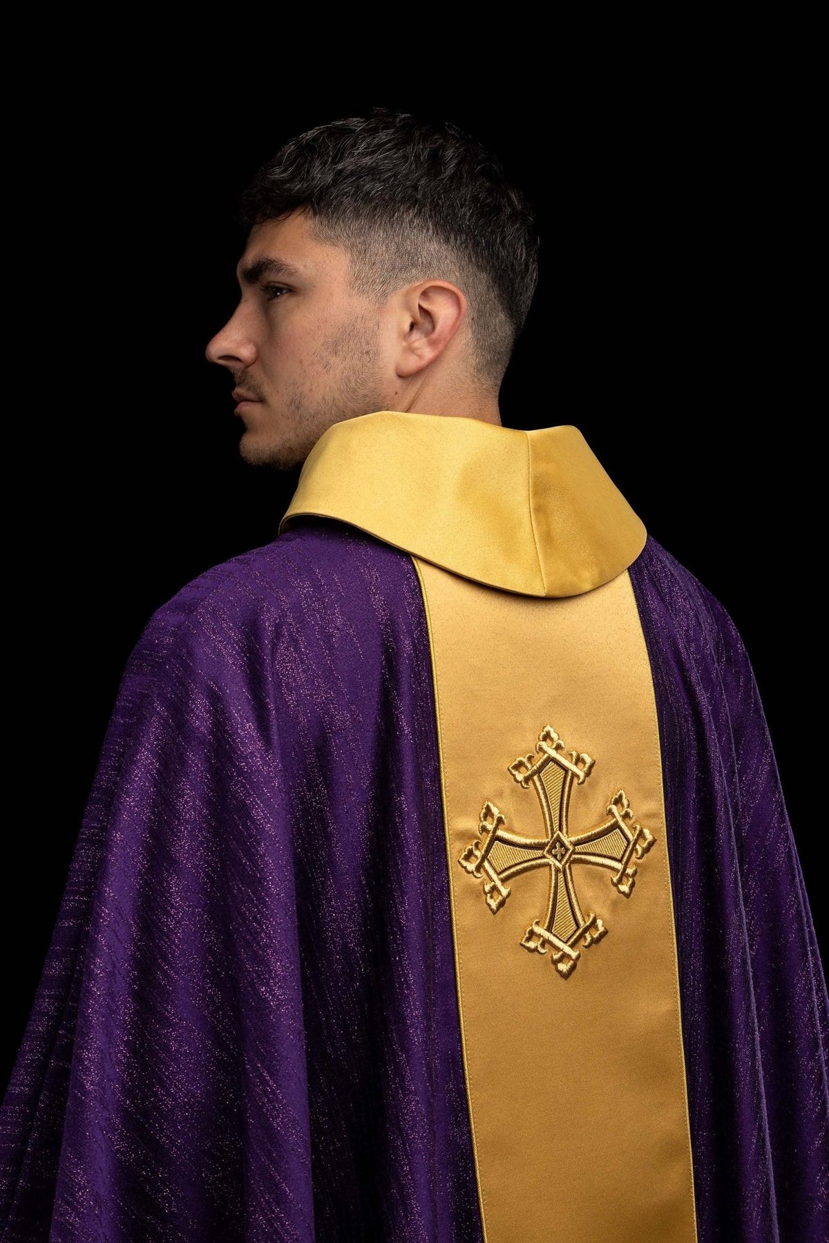 Purple chasuble front close-up with gold orphrey and embroidered cross