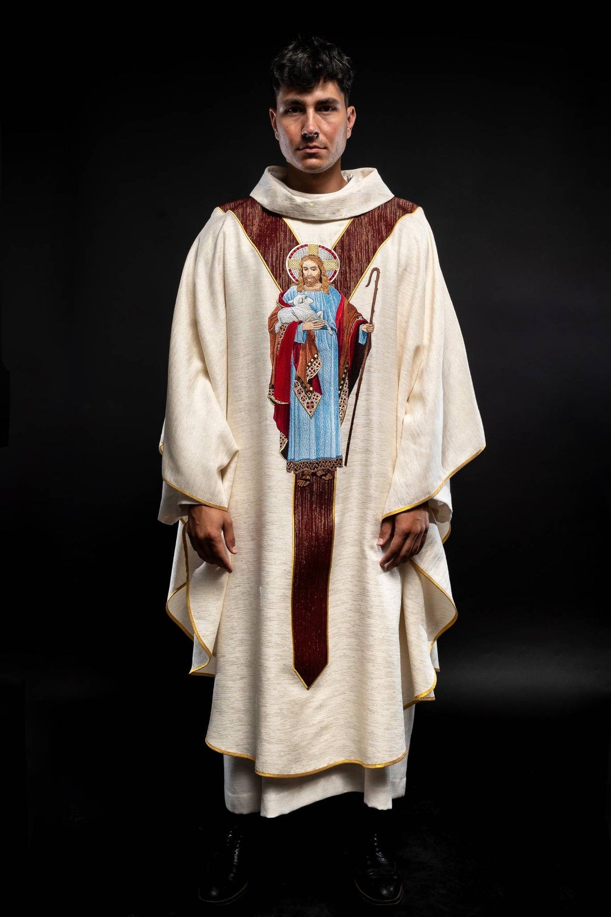 Ecru chasuble front view with burgundy orphrey and Good Shepherd embroidery