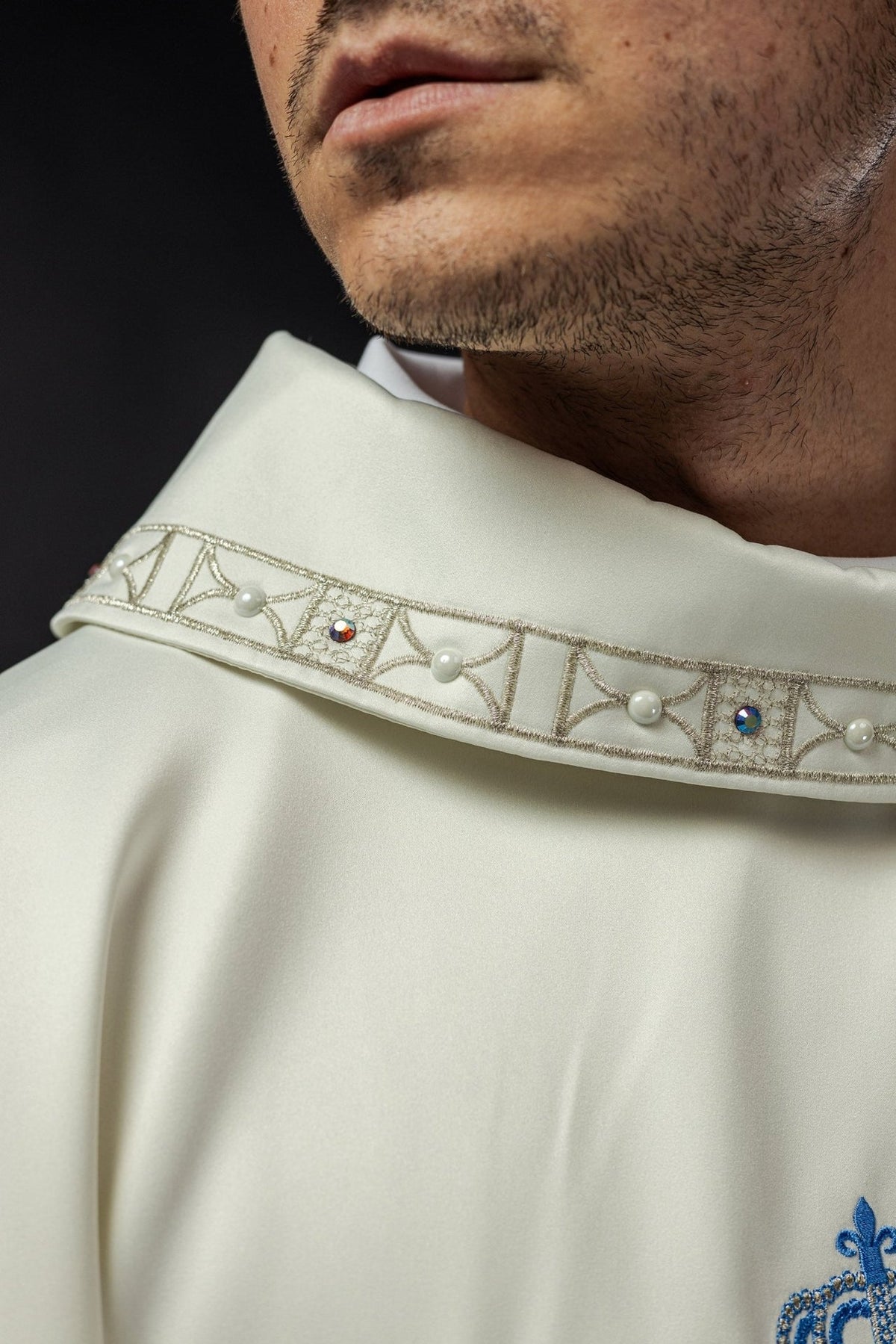 Marian chasuble stand-up collar close-up with gold trim, pearls and blue stones