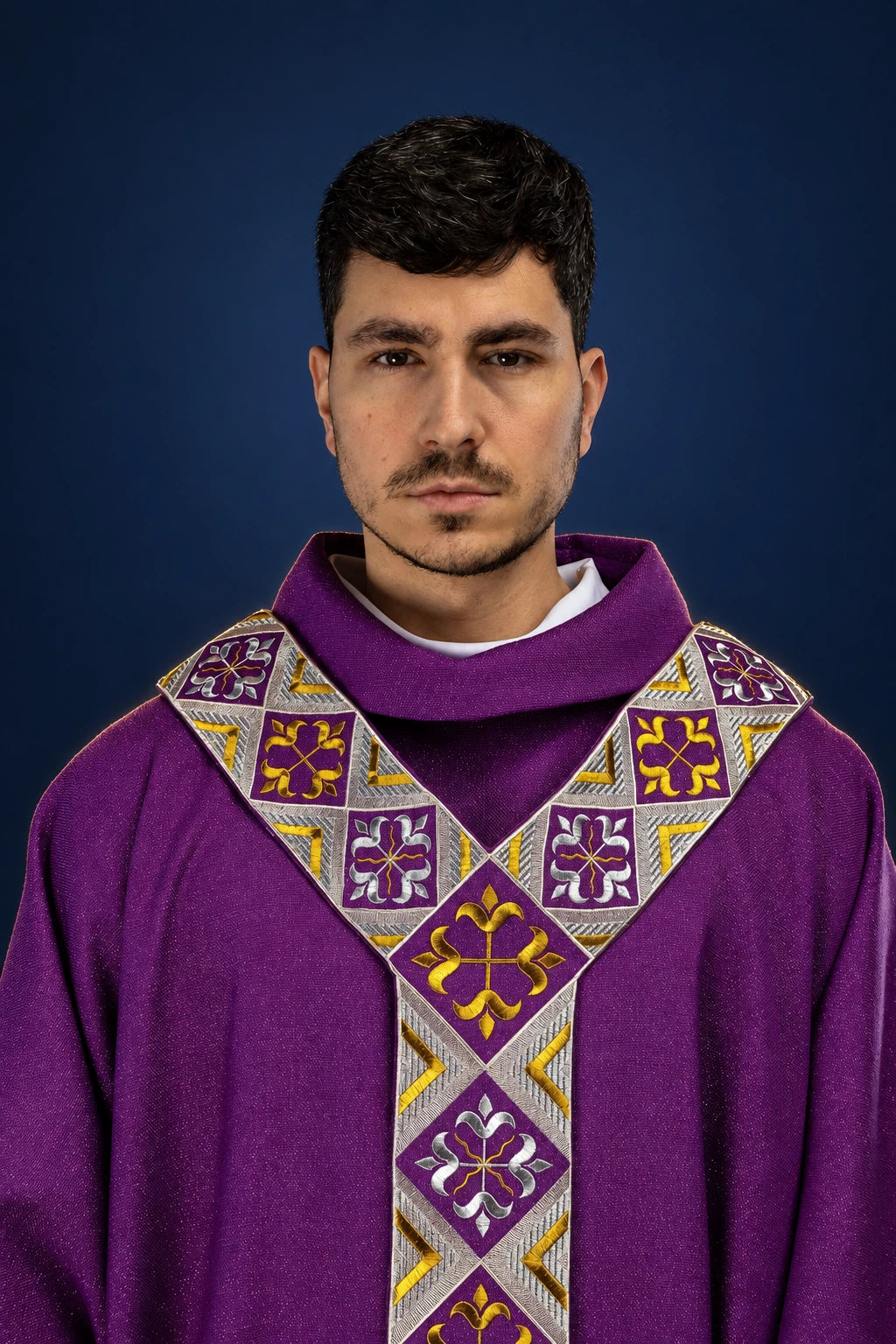 Embroidered Purple Orphrey with Purple Chasuble worn from the front, with silver and gold cross motifs