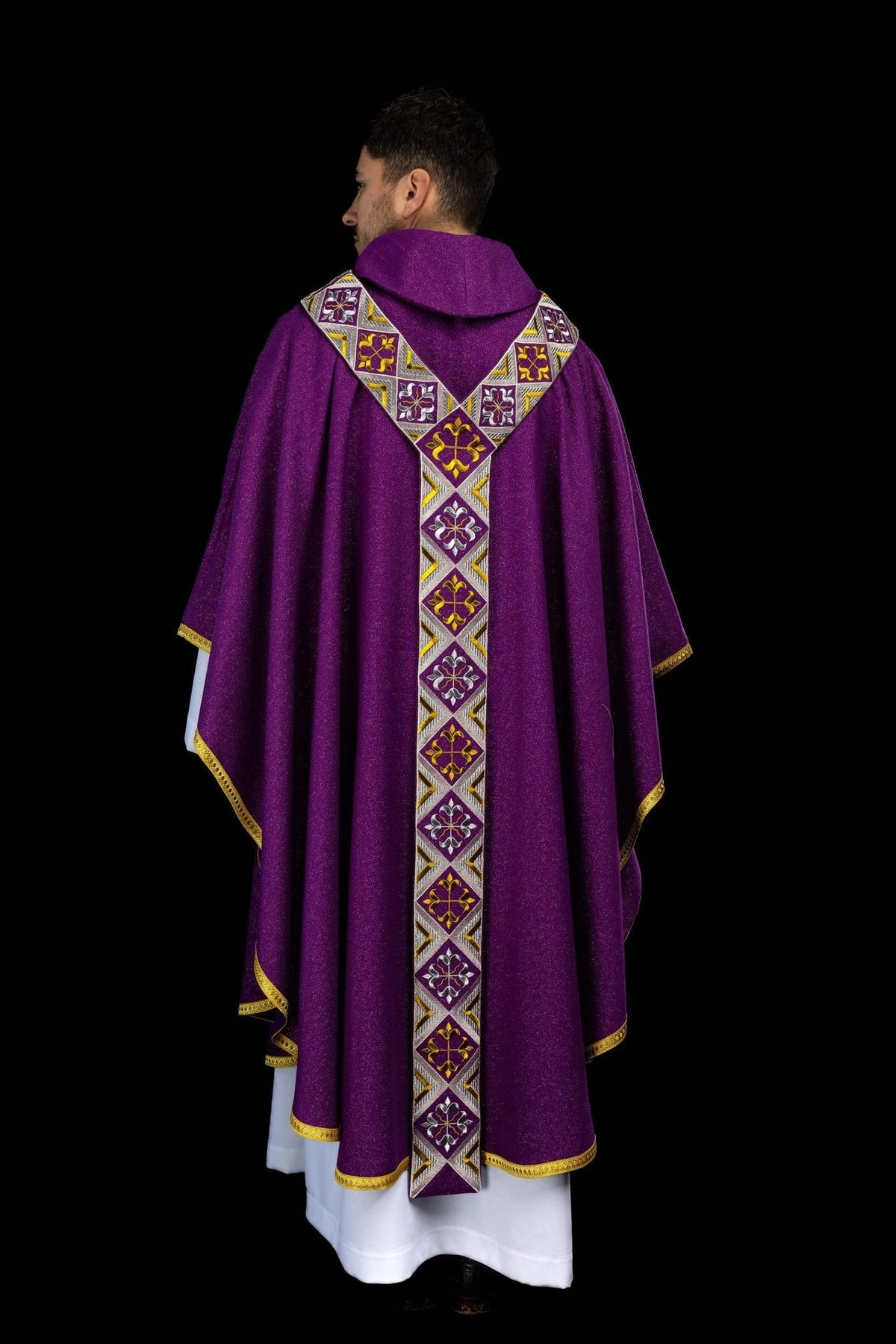 Purple chasuble worn from the back with full-length embroidered orphrey
