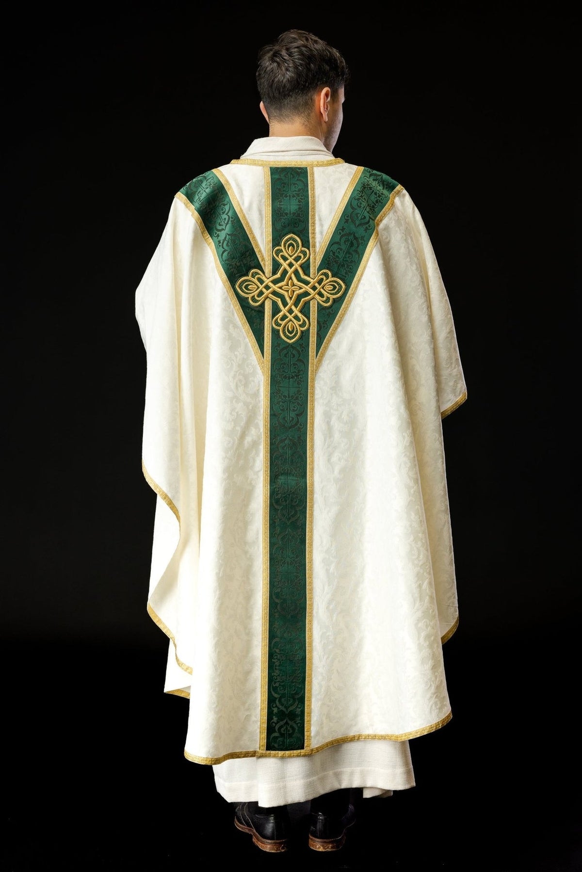 Chasuble back view with green velvet orphrey and embroidered gold cross