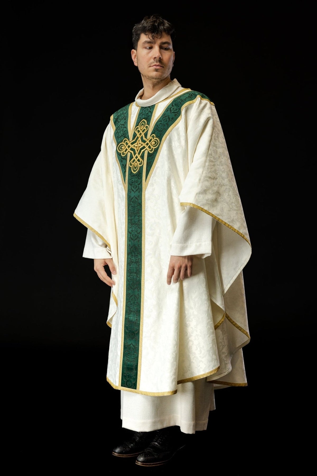 White and green chasuble, angled front view with gold-trimmed edges
