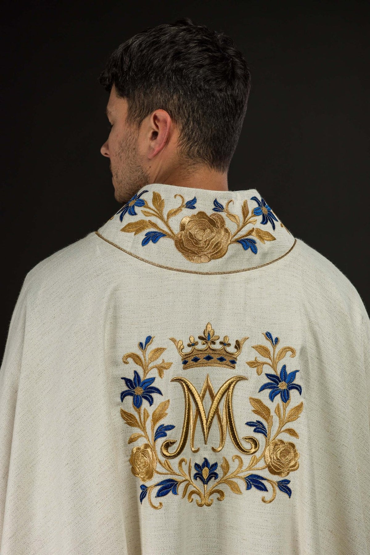 Ecru Marian chasuble side view showing embroidered floral stand-up collar