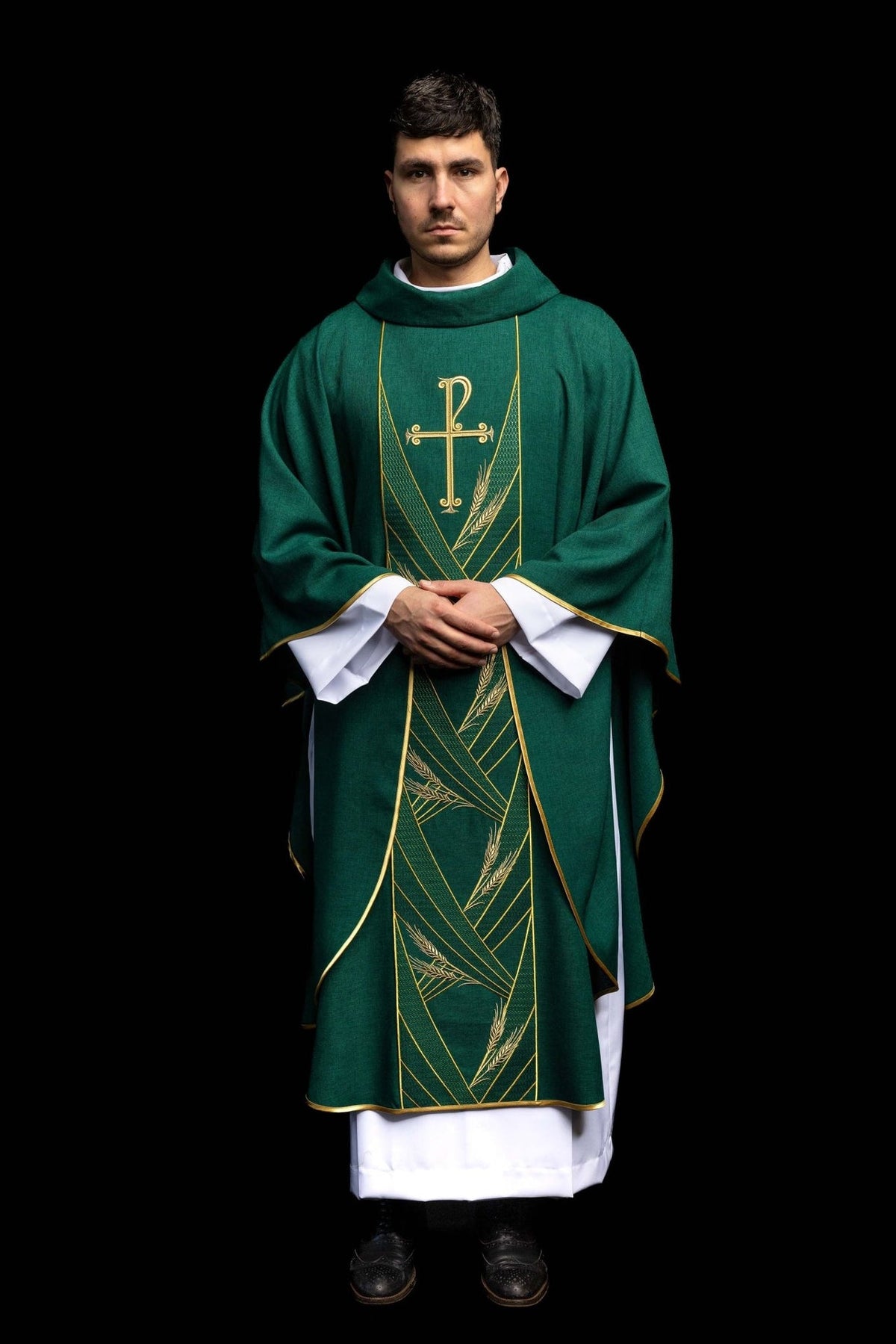 Green chasuble front view showing stand-up collar, gold trim and embroidered orphrey