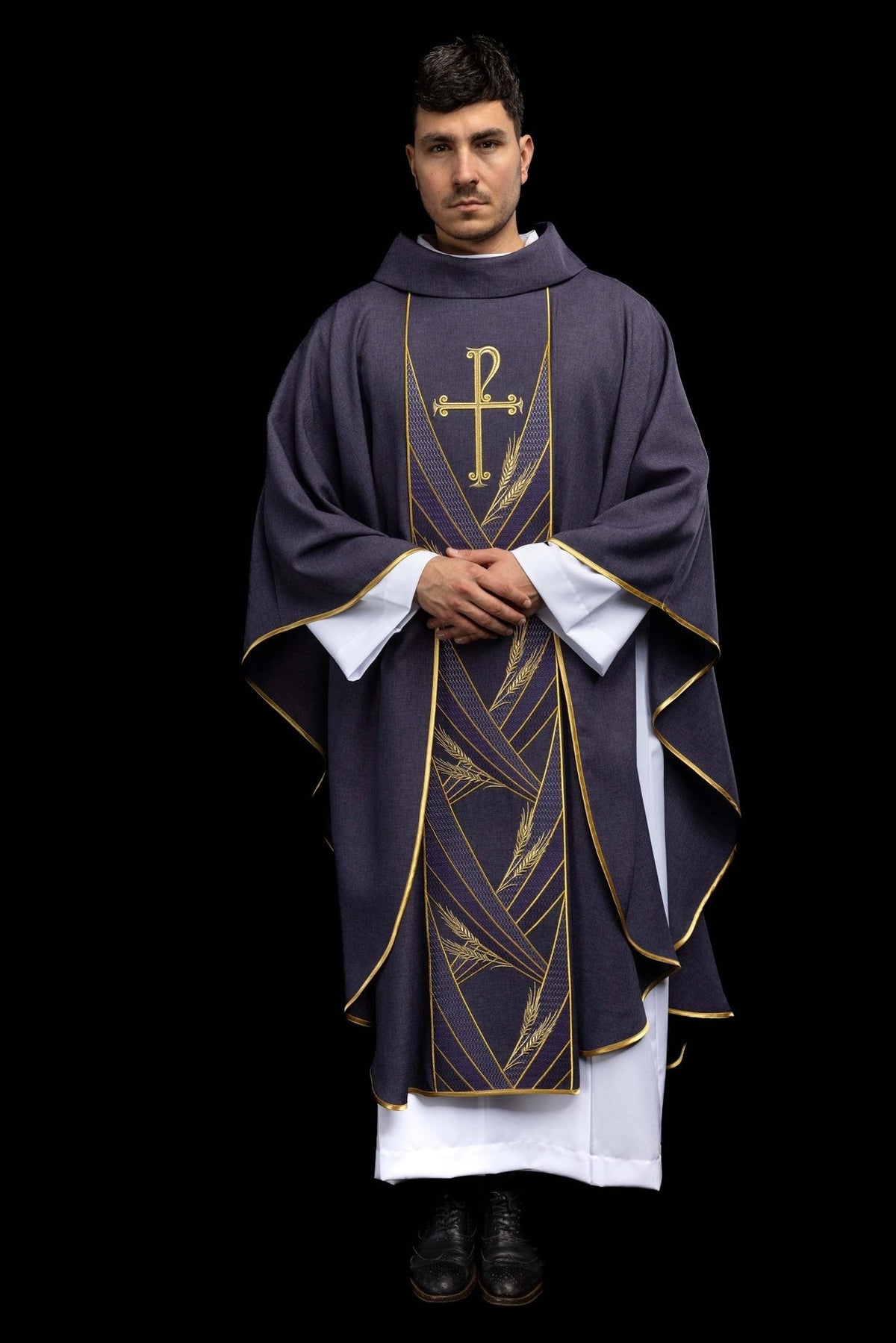 Purple chasuble full front view with gold trim and embroidered orphrey