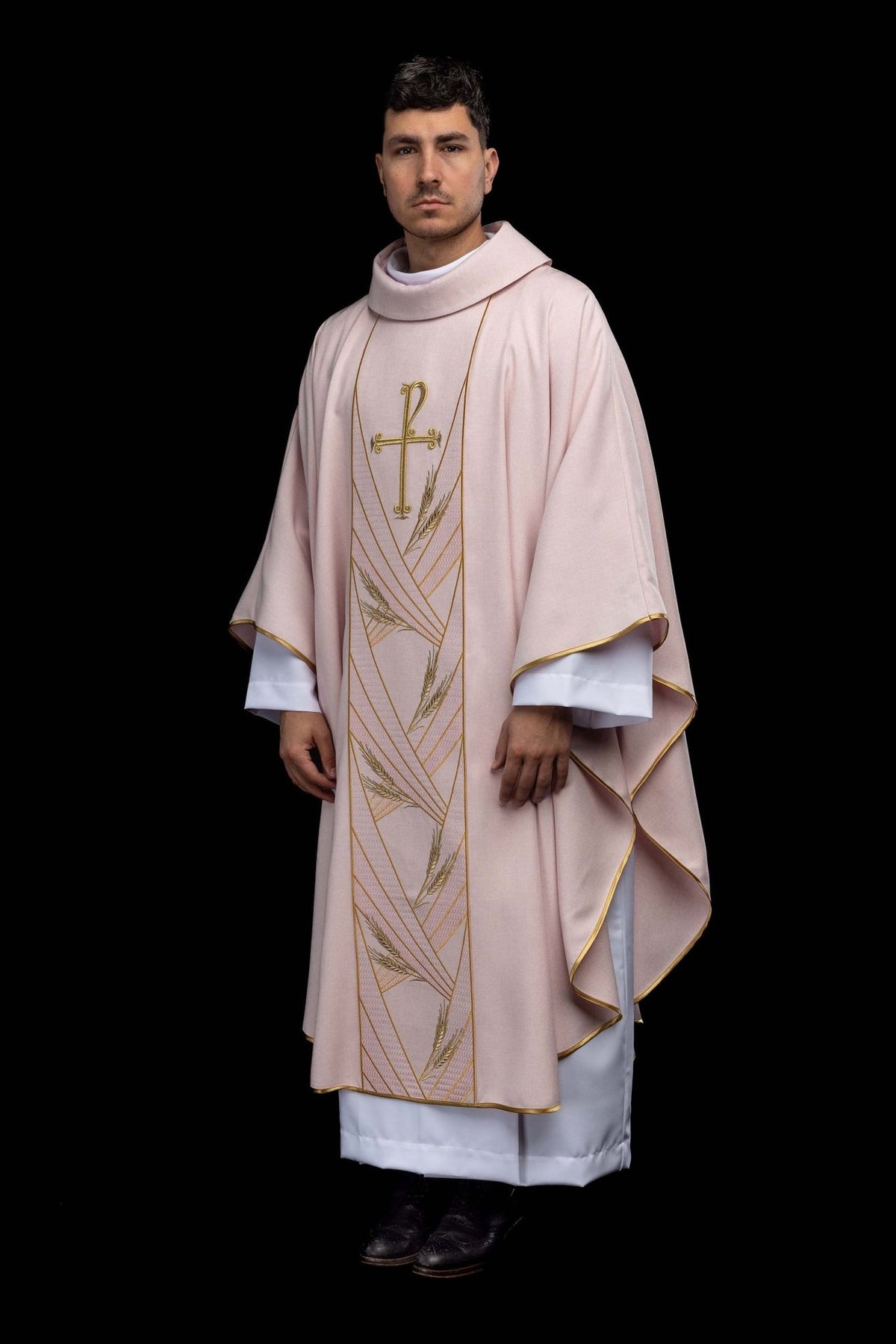 Rose chasuble three-quarter front view with gold-trimmed orphrey and wheat embroidery