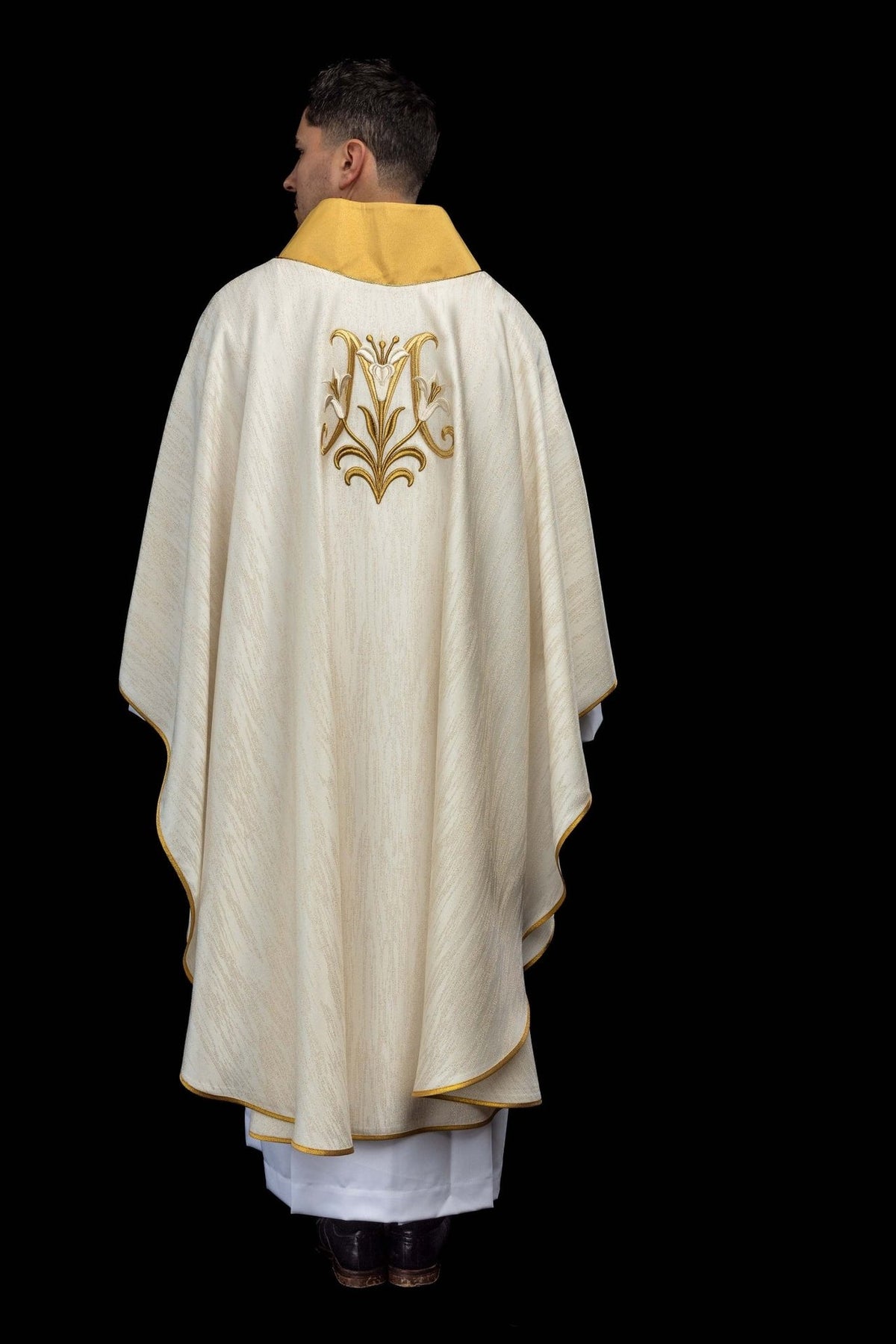 Chasuble back view with centered Marian motif and gold trim