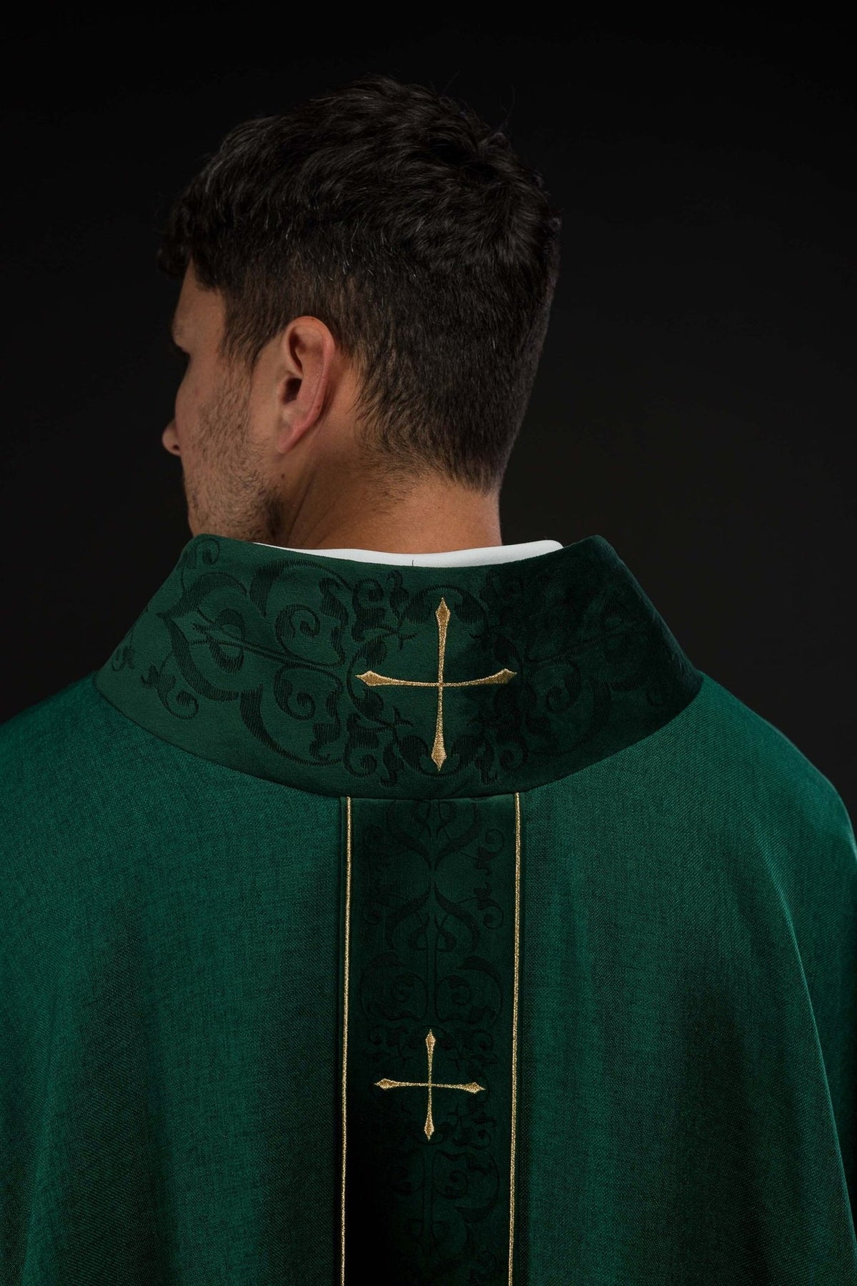 Green chasuble back view with embroidered collar and vertical orphrey