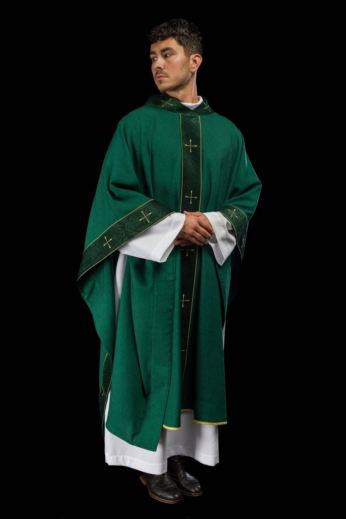 Green chasuble three-quarter front view with embroidered sleeves and gold trim