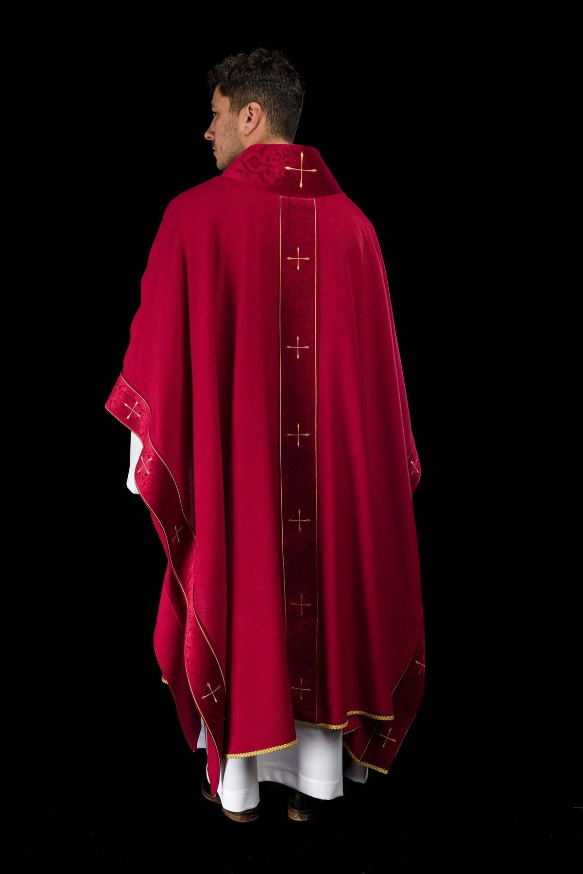 Red chasuble back view showing full embroidered orphrey