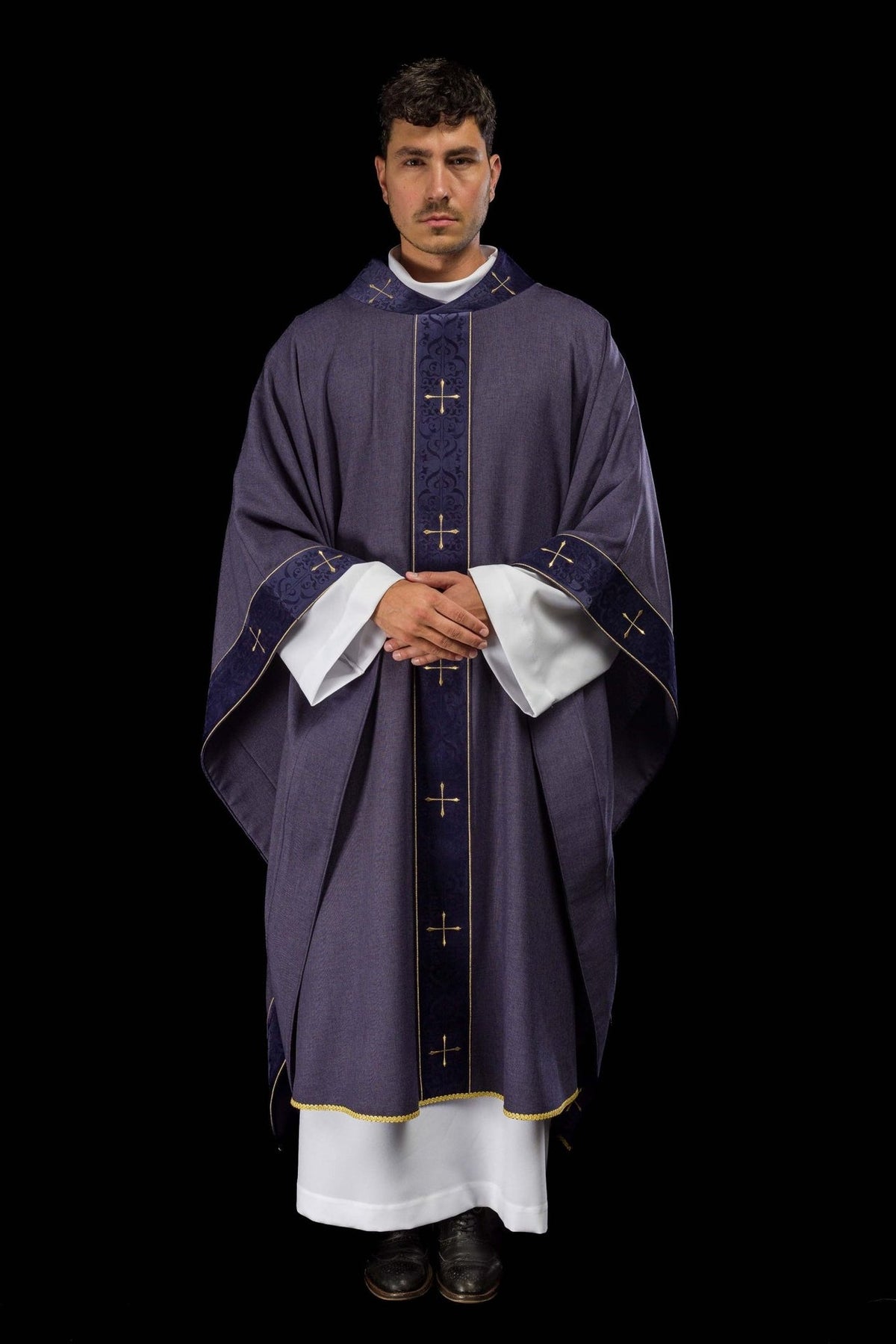 Purple chasuble front view with embroidered orphrey, gold crosses and matching cuffs