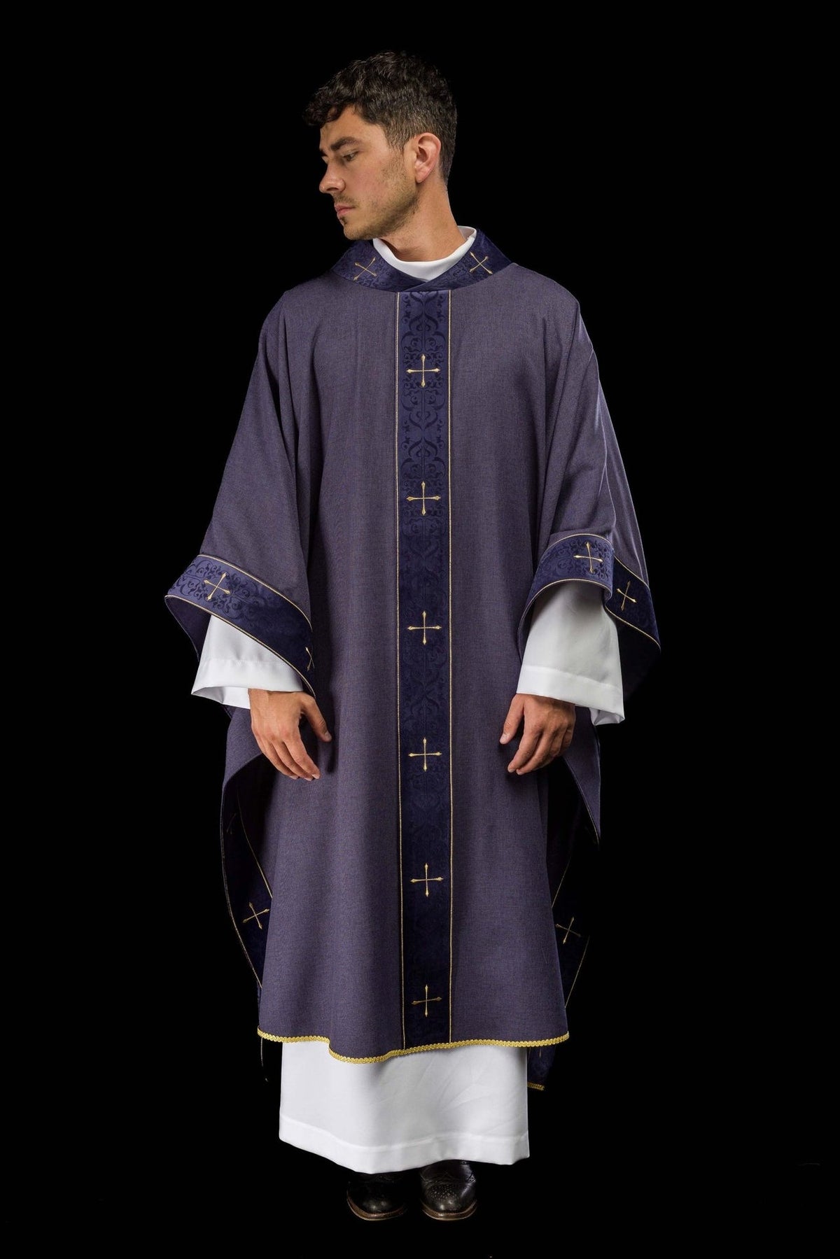 Purple chasuble front view showing full length, embroidered orphrey and gold-edged hem