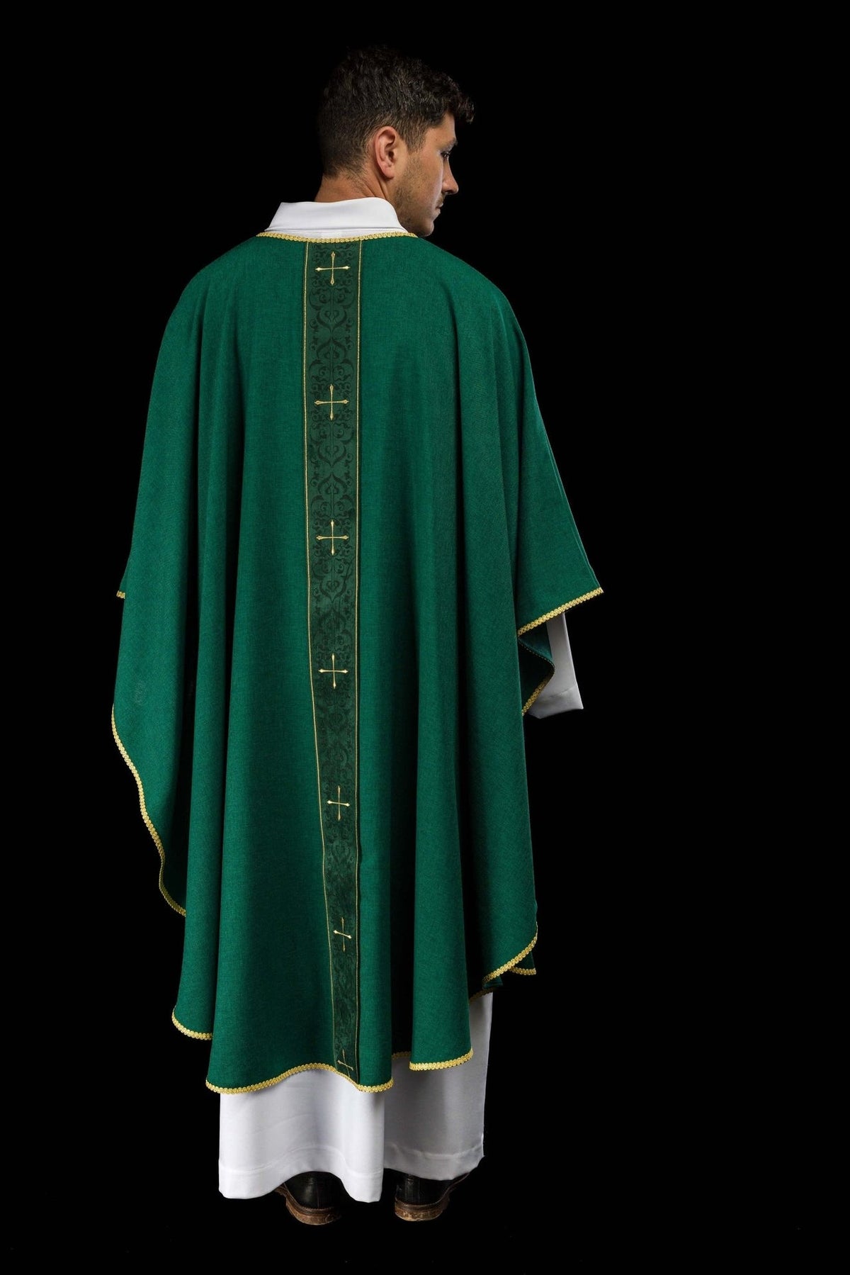 Green chasuble full back view with gold-trimmed edges and embroidered orphrey