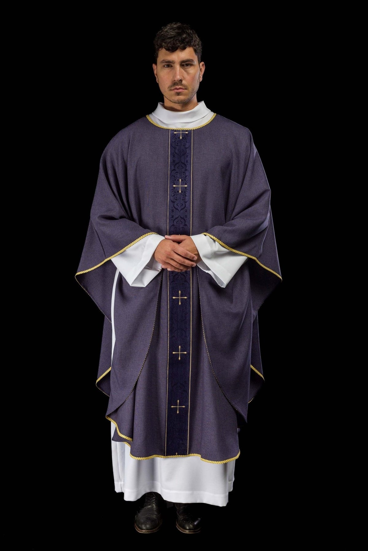 Purple chasuble worn full length, front view with gold crosses and trim