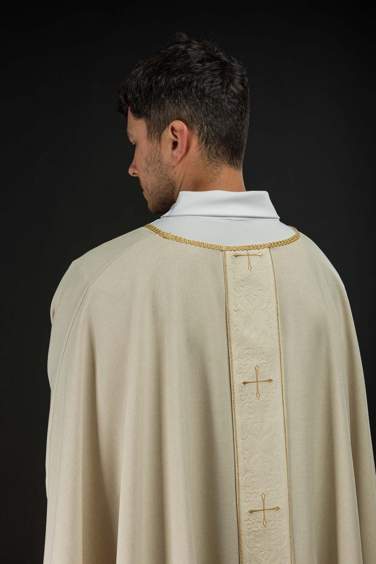 Ecru chasuble back view with embroidered orphrey and gold trim