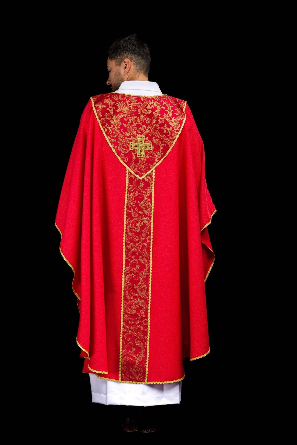 Red chasuble back view with gold cross and floral jacquard orphrey