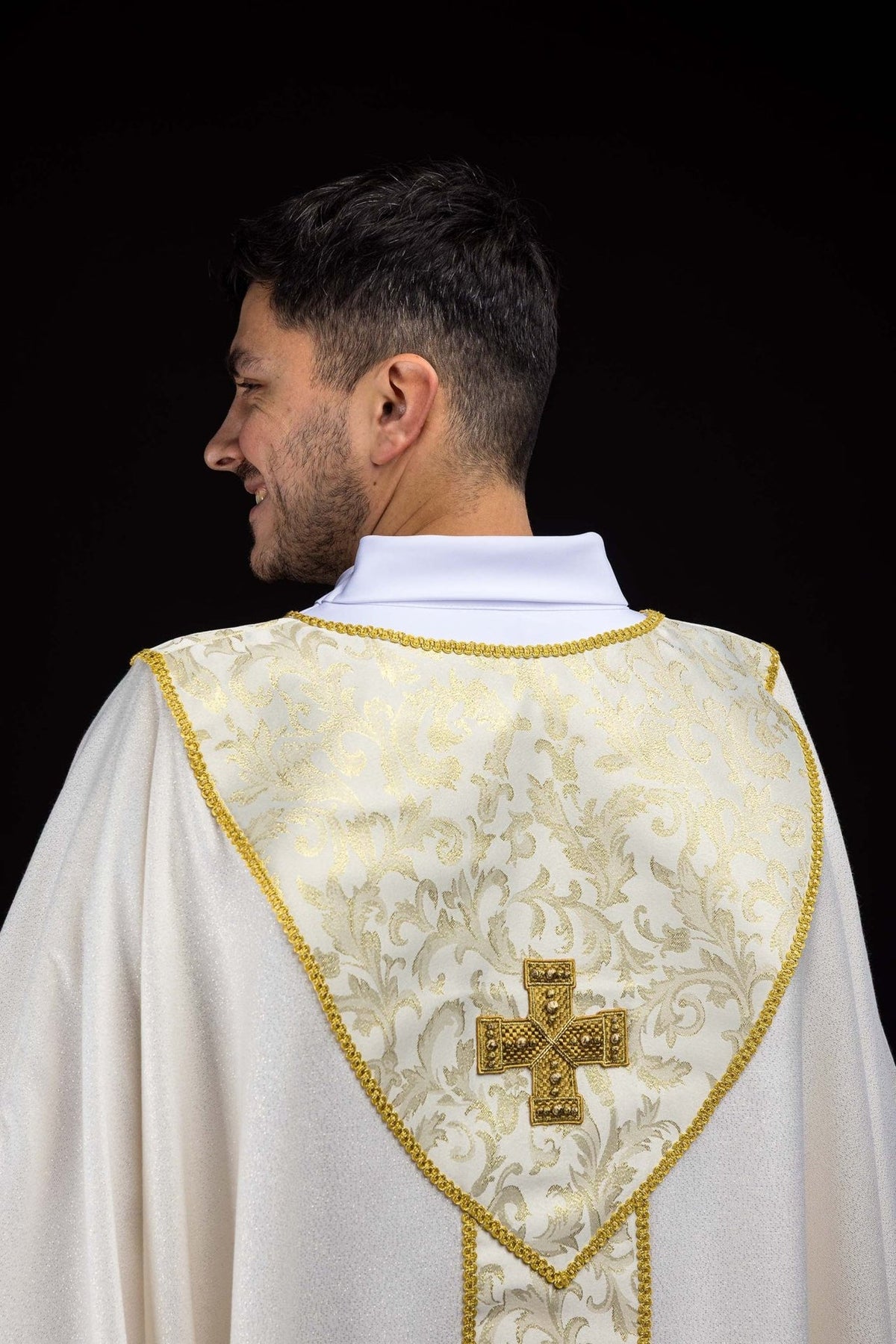 Ecru chasuble back view with gold cross and jacquard orphrey