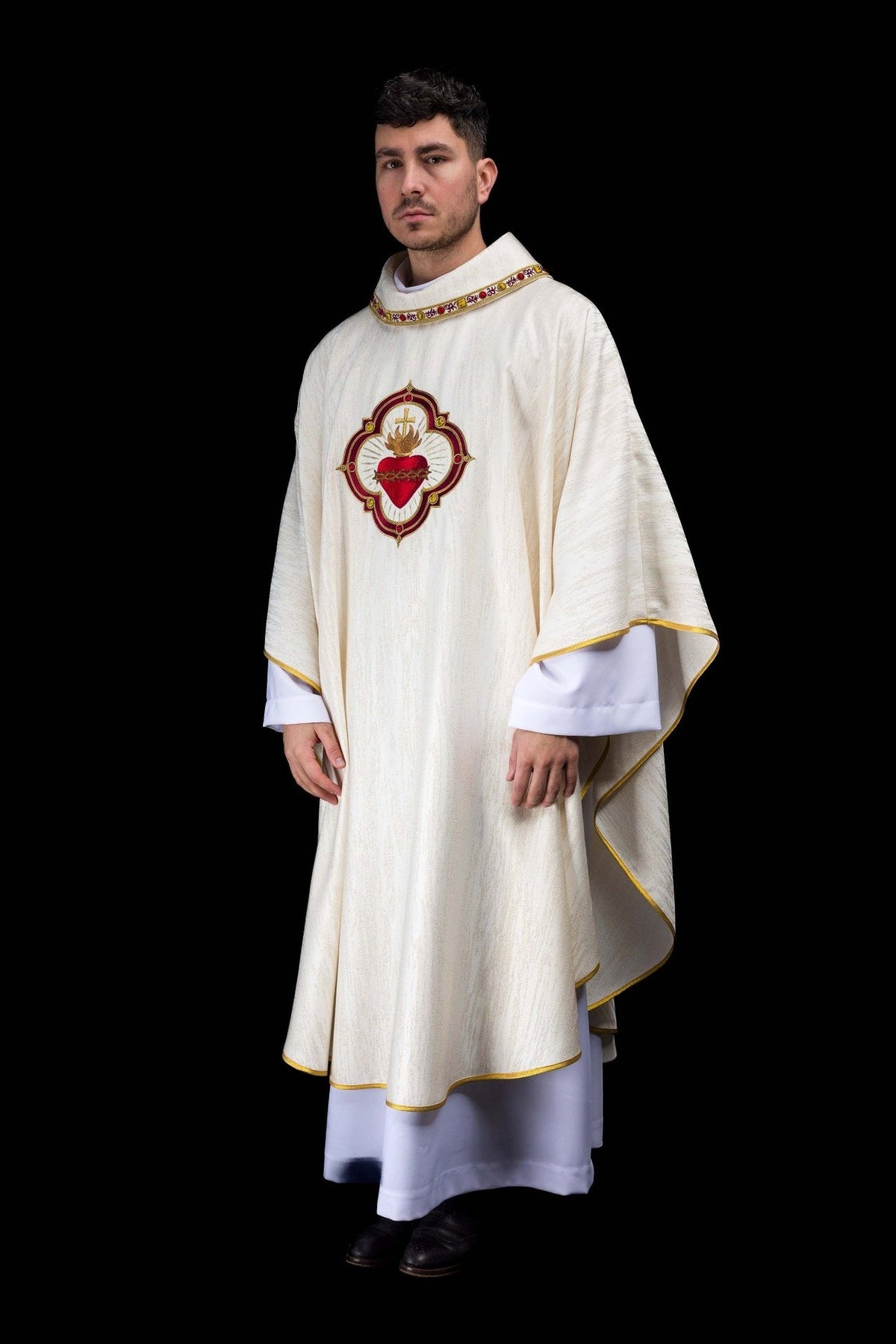 Chasuble front view in cream with gold trim and Sacred Heart of Jesus embroidery