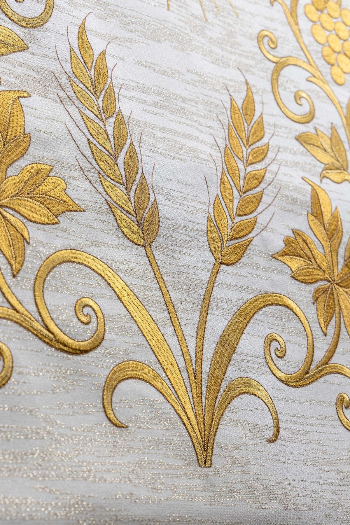 Ecru lectern cover close-up showing embroidered gold wheat and scrolling vine details