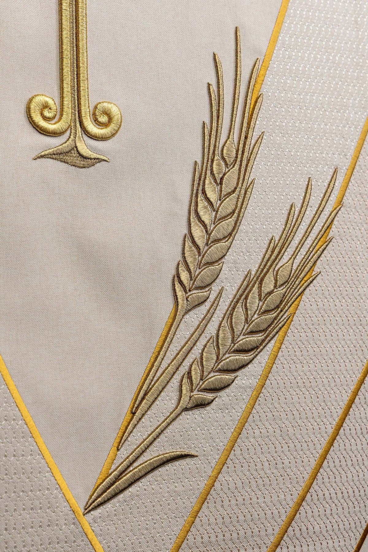 Church lectern cover detail of gold wheat embroidery on ecru fabric